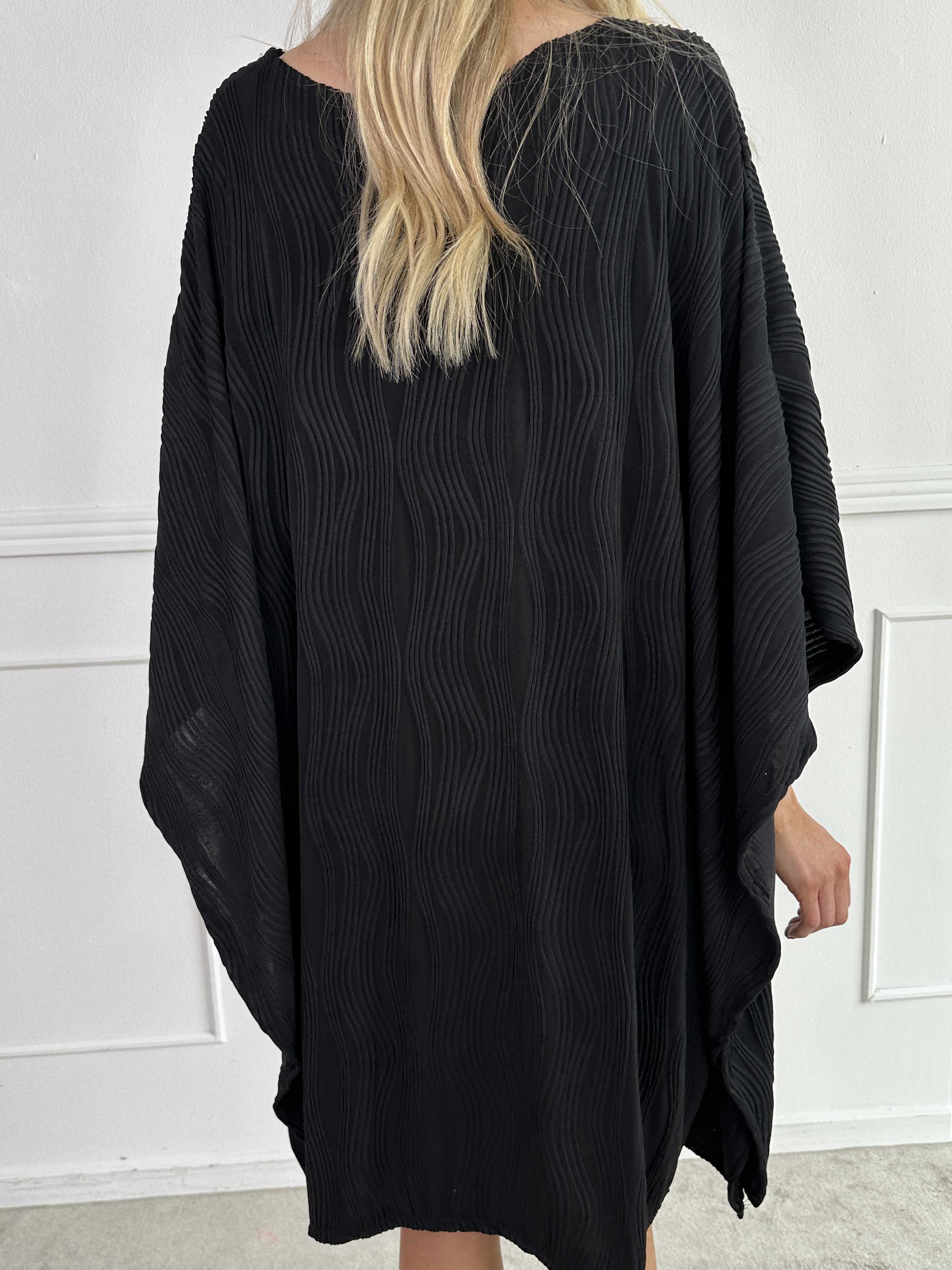 Kaja - Elastisk tunika i mjukt ribbat tyg