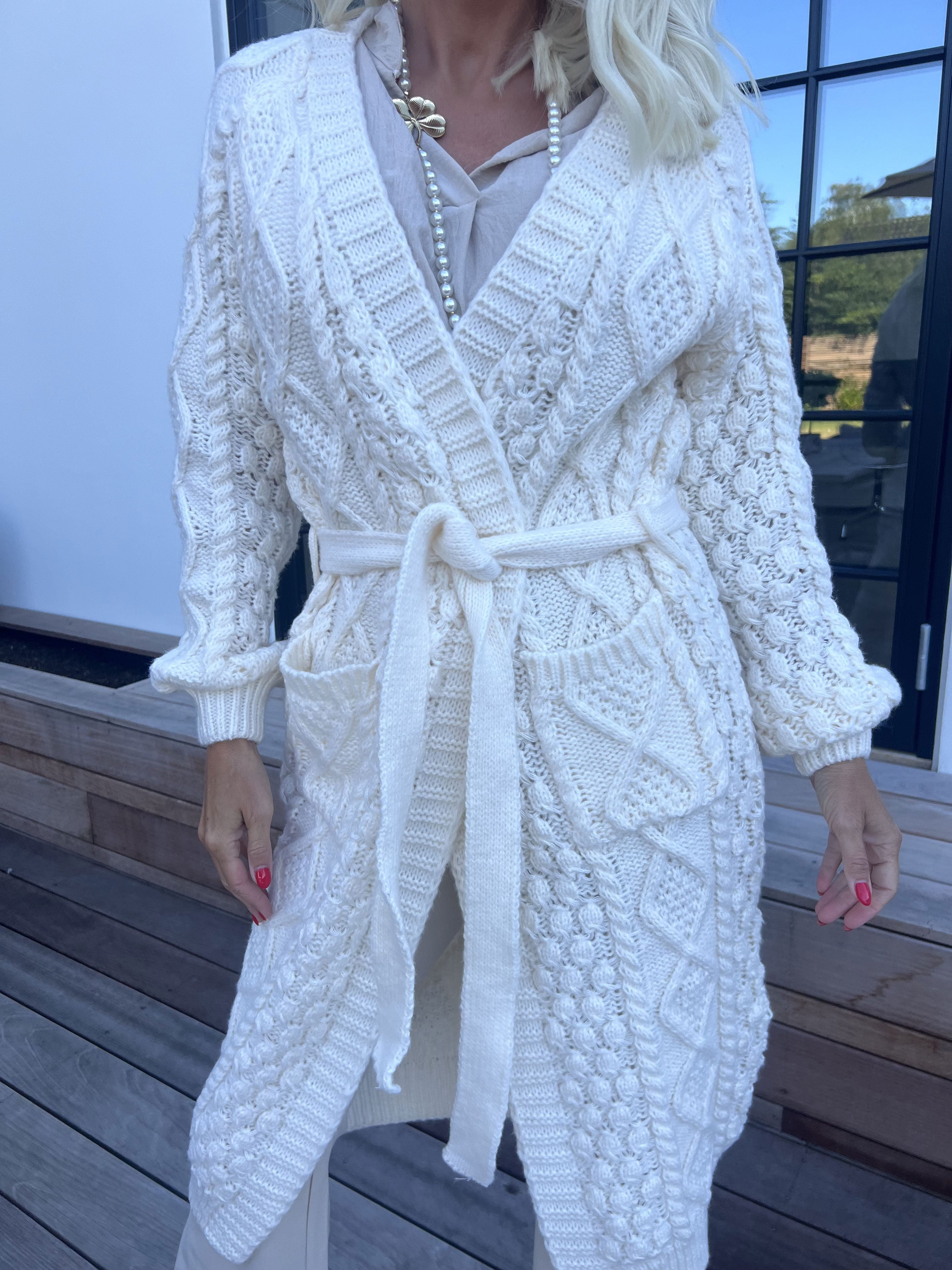 Karui - Snygg stickad kofta med knytband