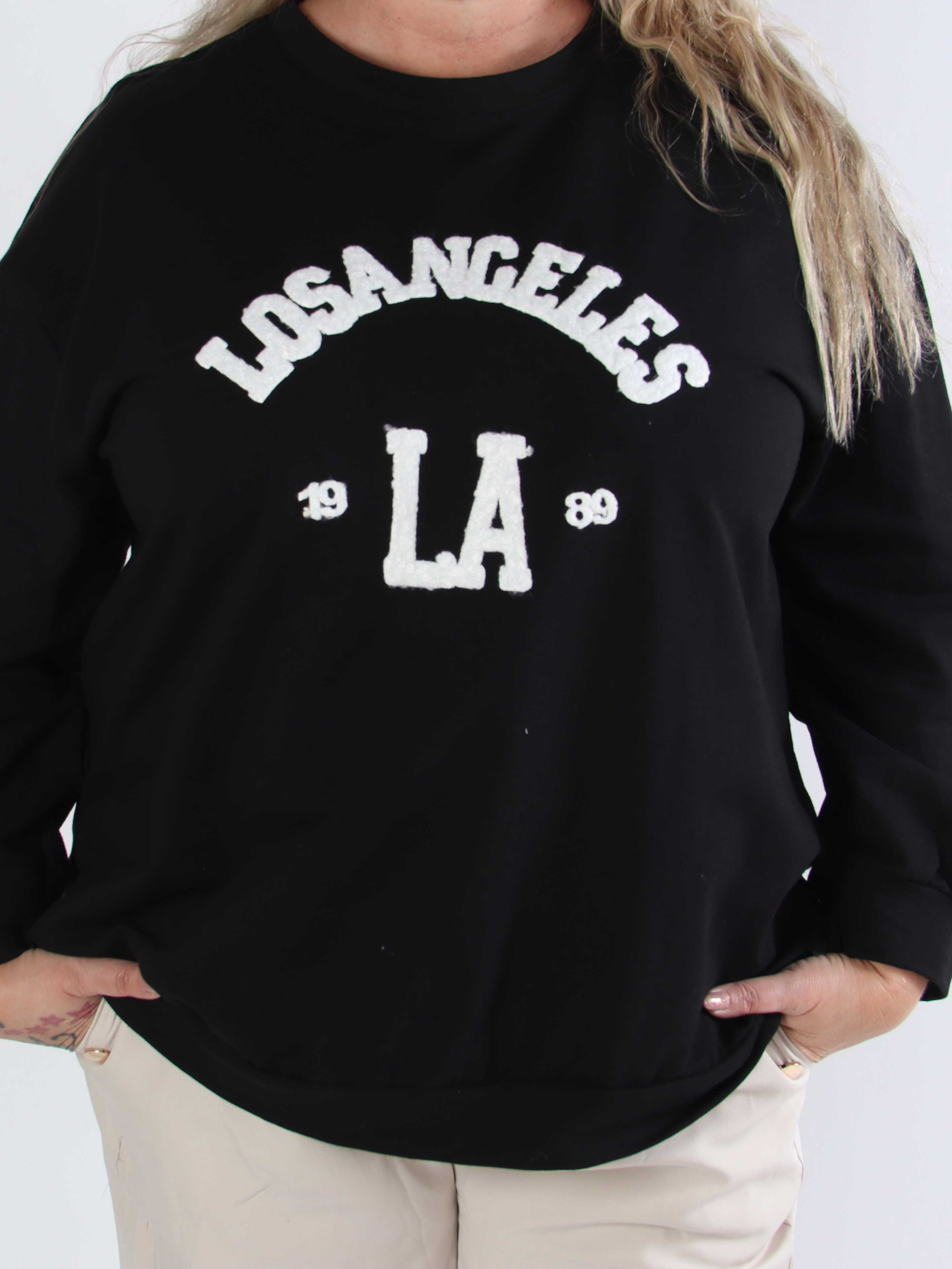 Magnolia - Plus size joggingtopp med LA skrivet i plysch