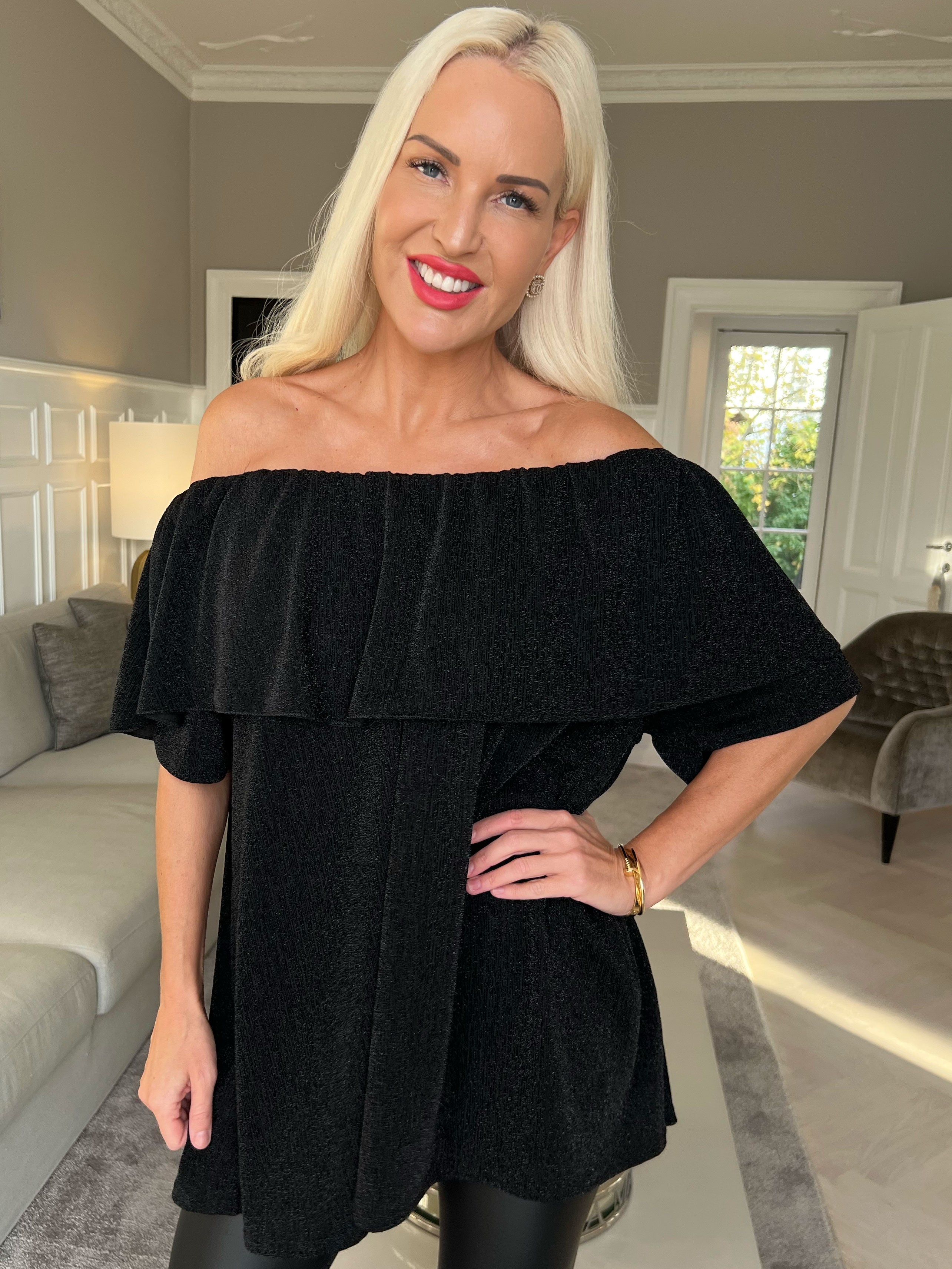 Maily - Off shoulder-blus med glittertrådar