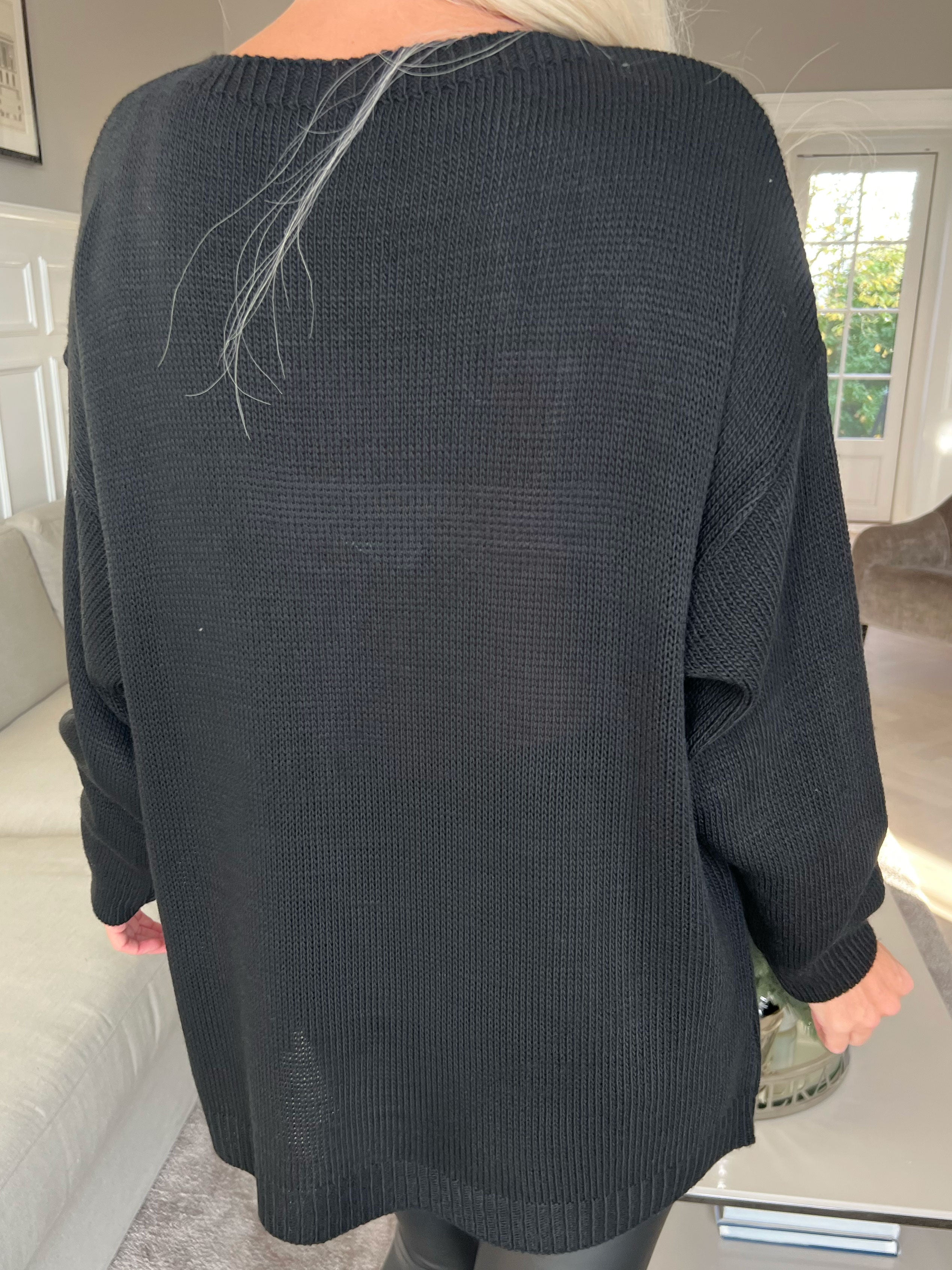 Mia - Stickad blus med fyrklövermotiv