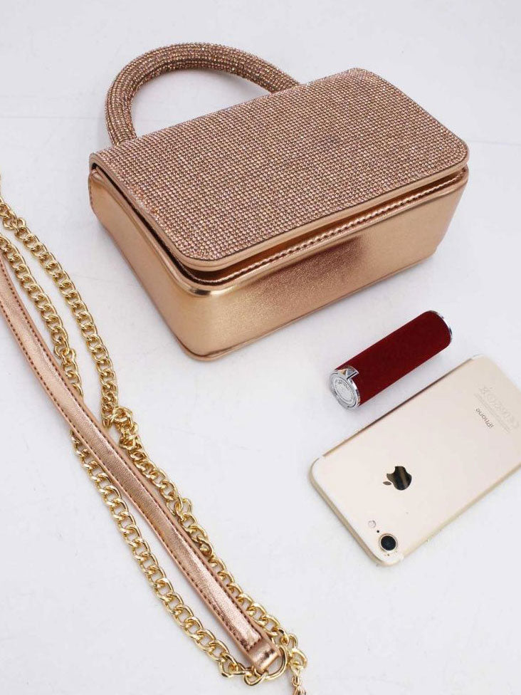 Milou - Liten handväska med dekor i konstläder