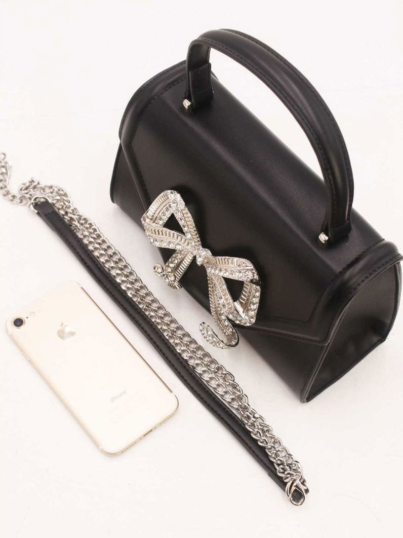 Miriam - Liten handväska med konstgjord rosett