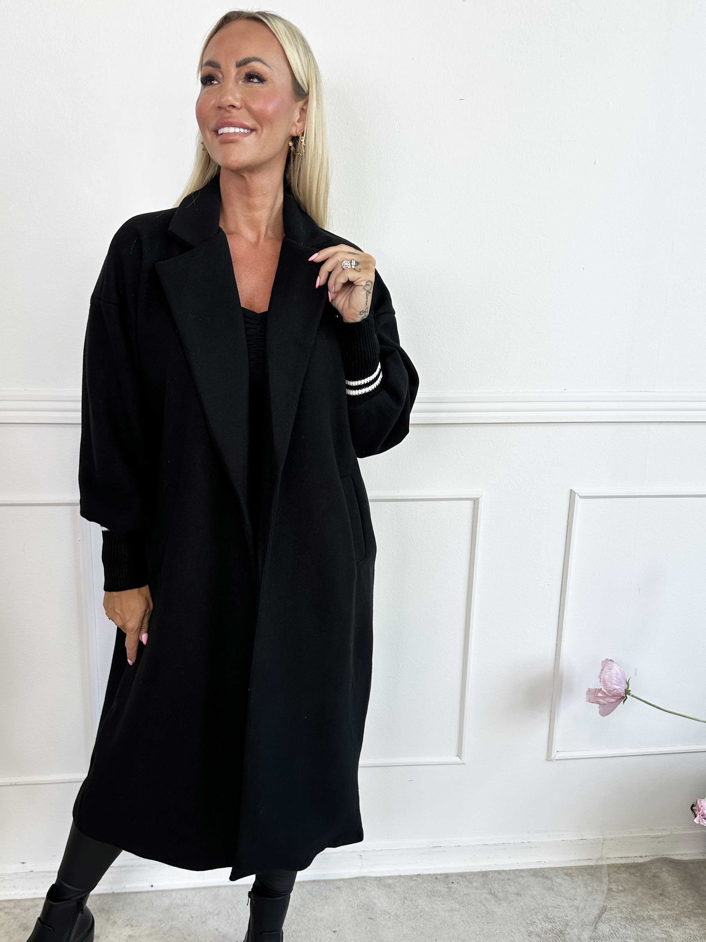 Nitas - Övergångsjacka med stickad del på ärmen