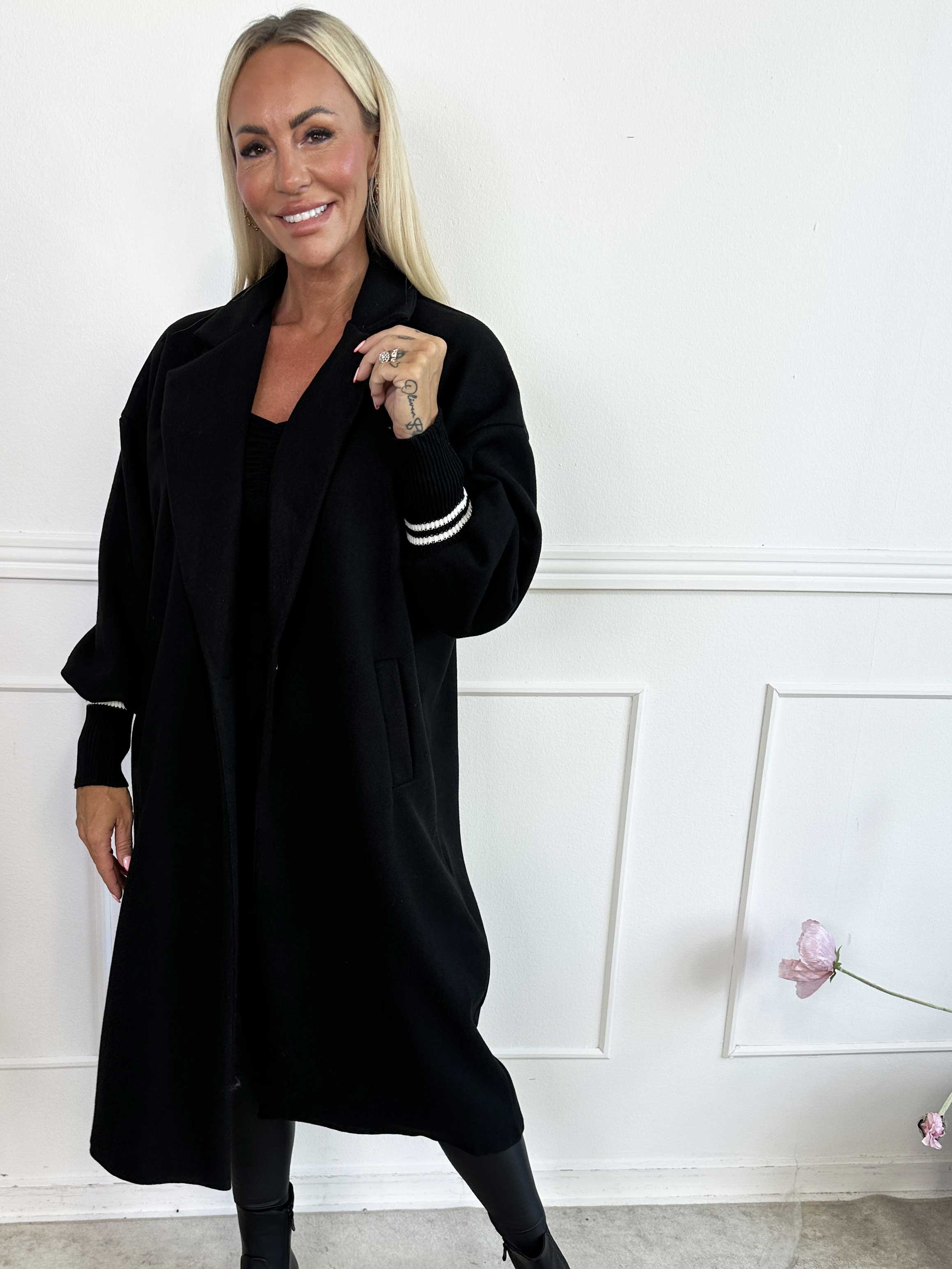 Nitas - Övergångsjacka med stickad del på ärmen