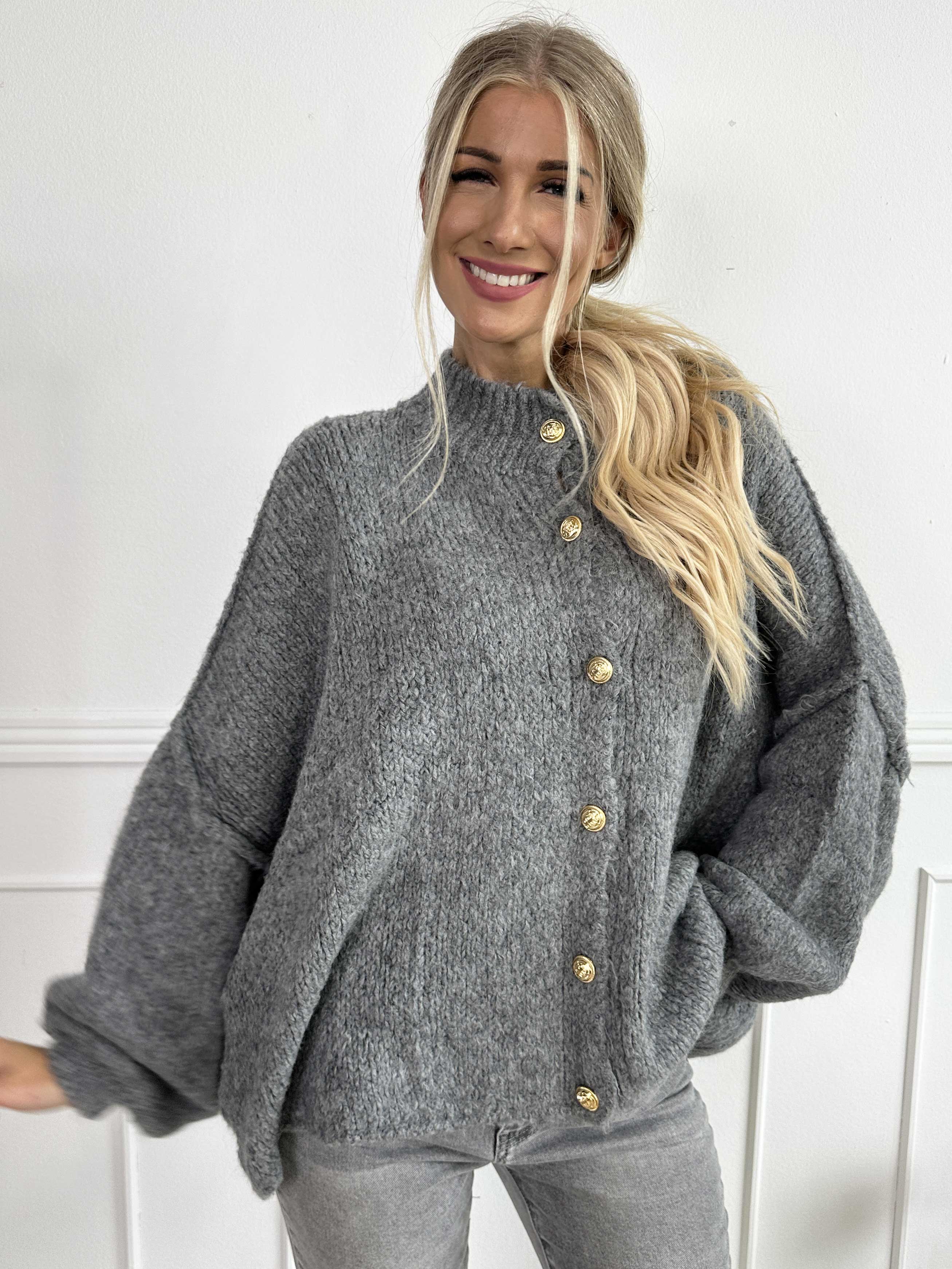 Olrun - Stickad kofta med ballongärmar och guldknappar