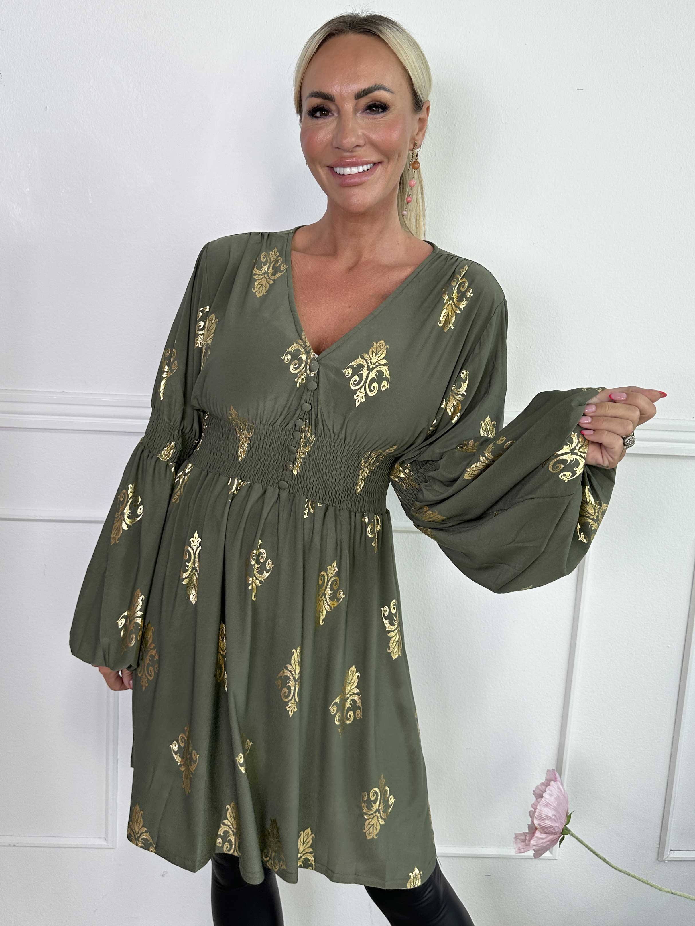 Paige Royal Gold - Elastisk klänning med guldfärgat mönster och knappar vid bysten