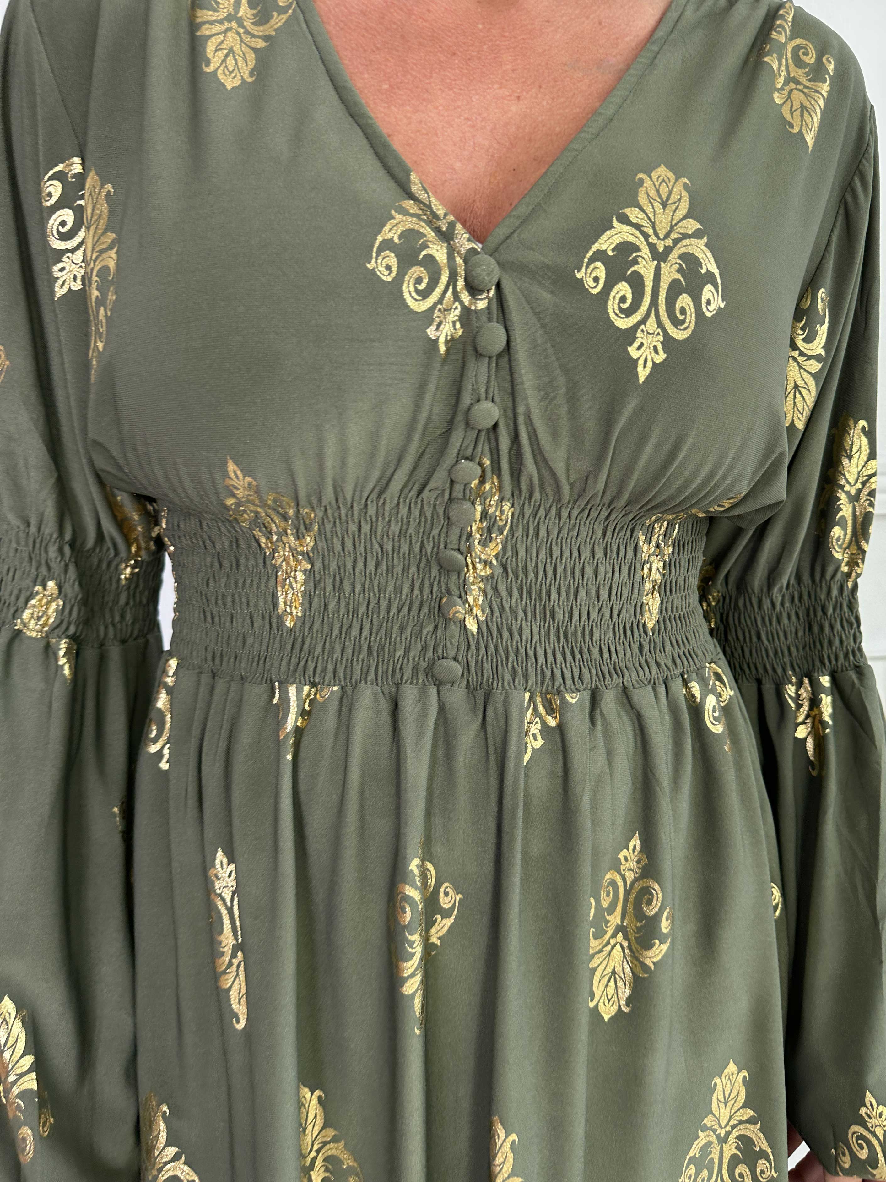 Paige Royal Gold - Elastisk klänning med guldfärgat mönster och knappar vid bysten