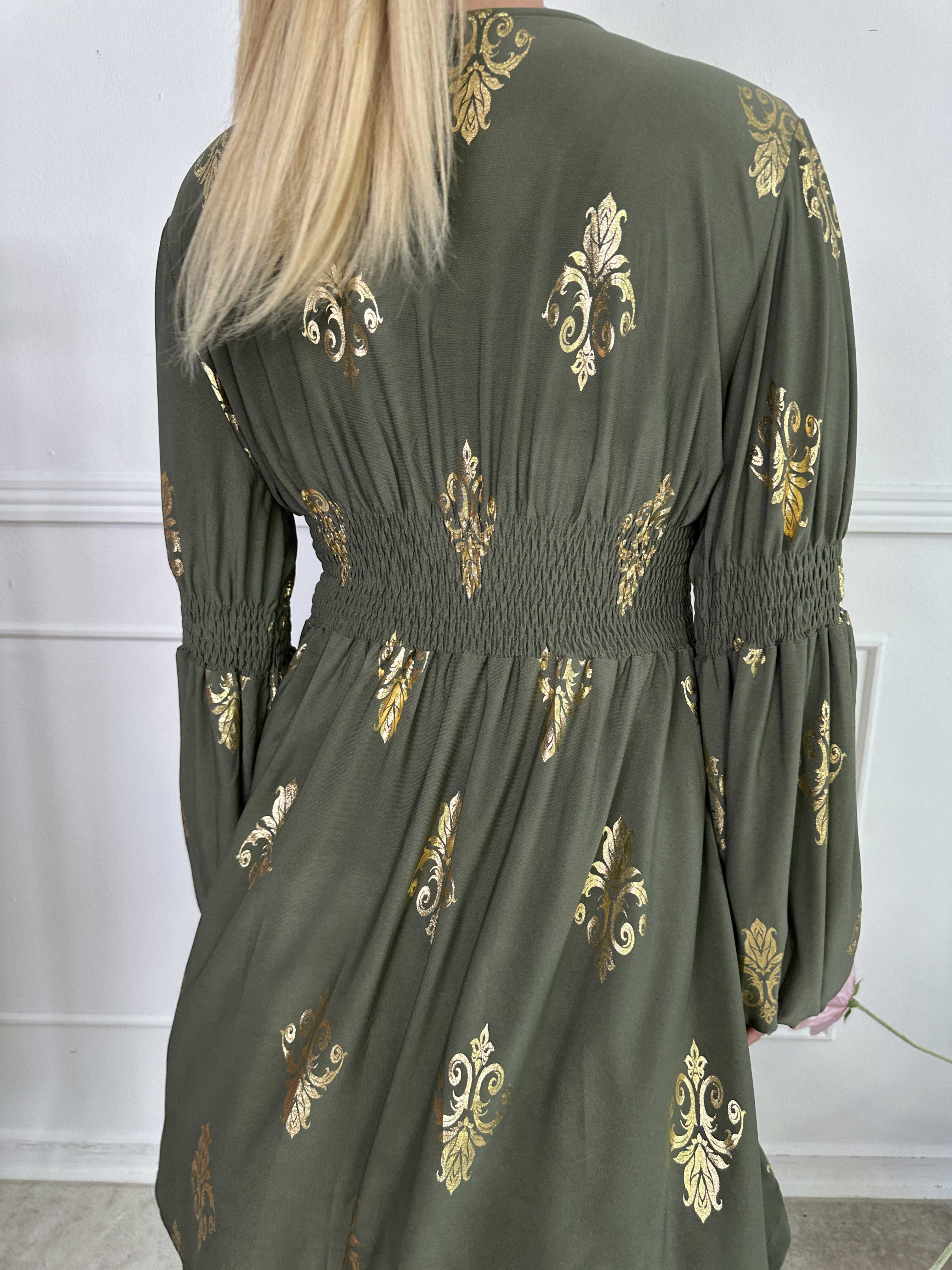 Paige Royal Gold - Elastisk klänning med guldfärgat mönster och knappar vid bysten