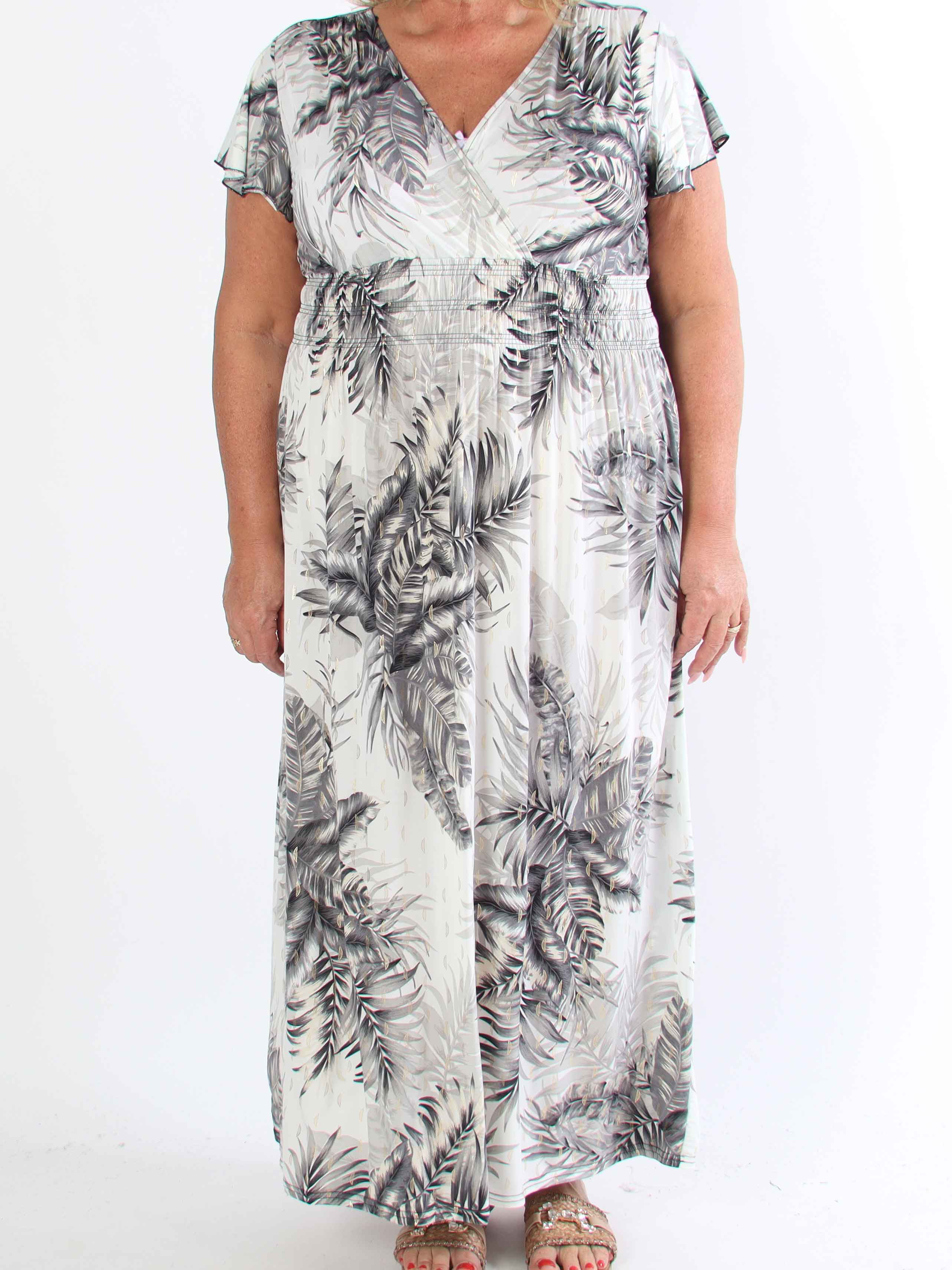 Palma - Elastisk klänning i plus size med blad och volangärmar