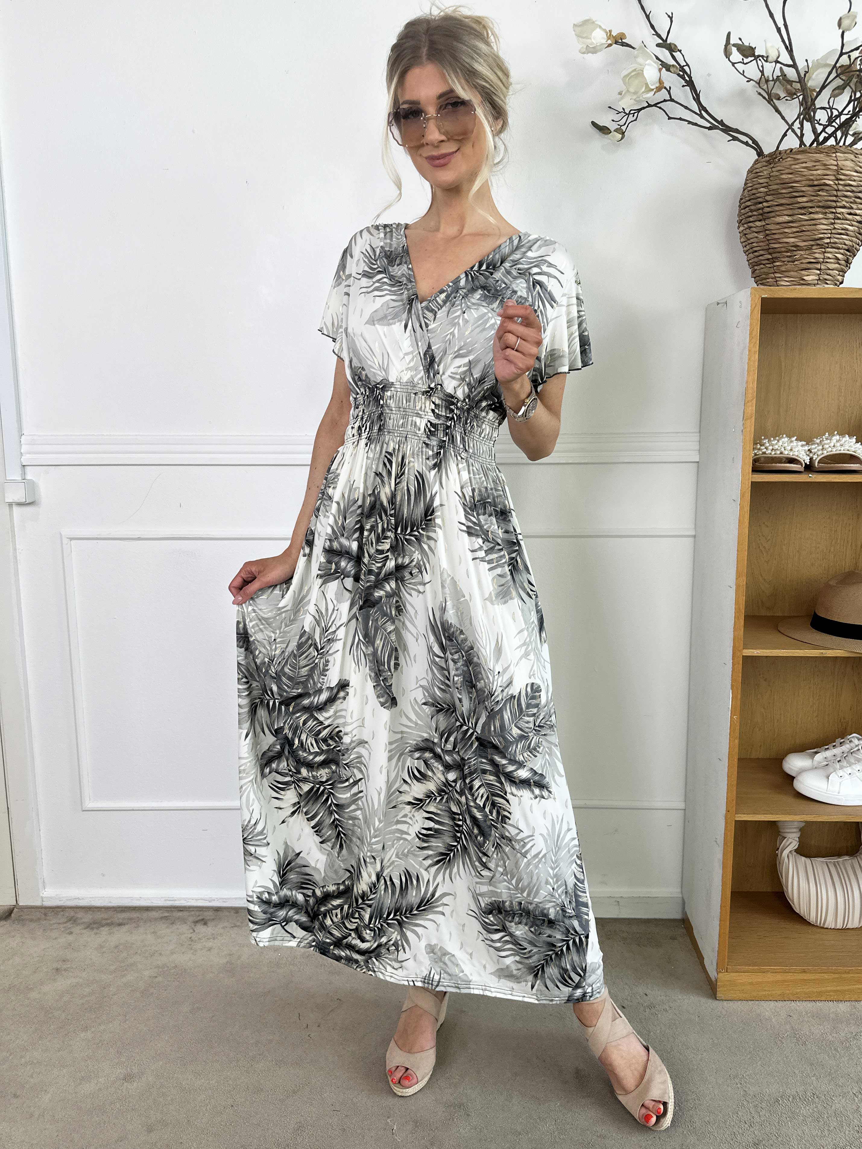 Palma - Lång elastisk klänning med blad och volangärmar