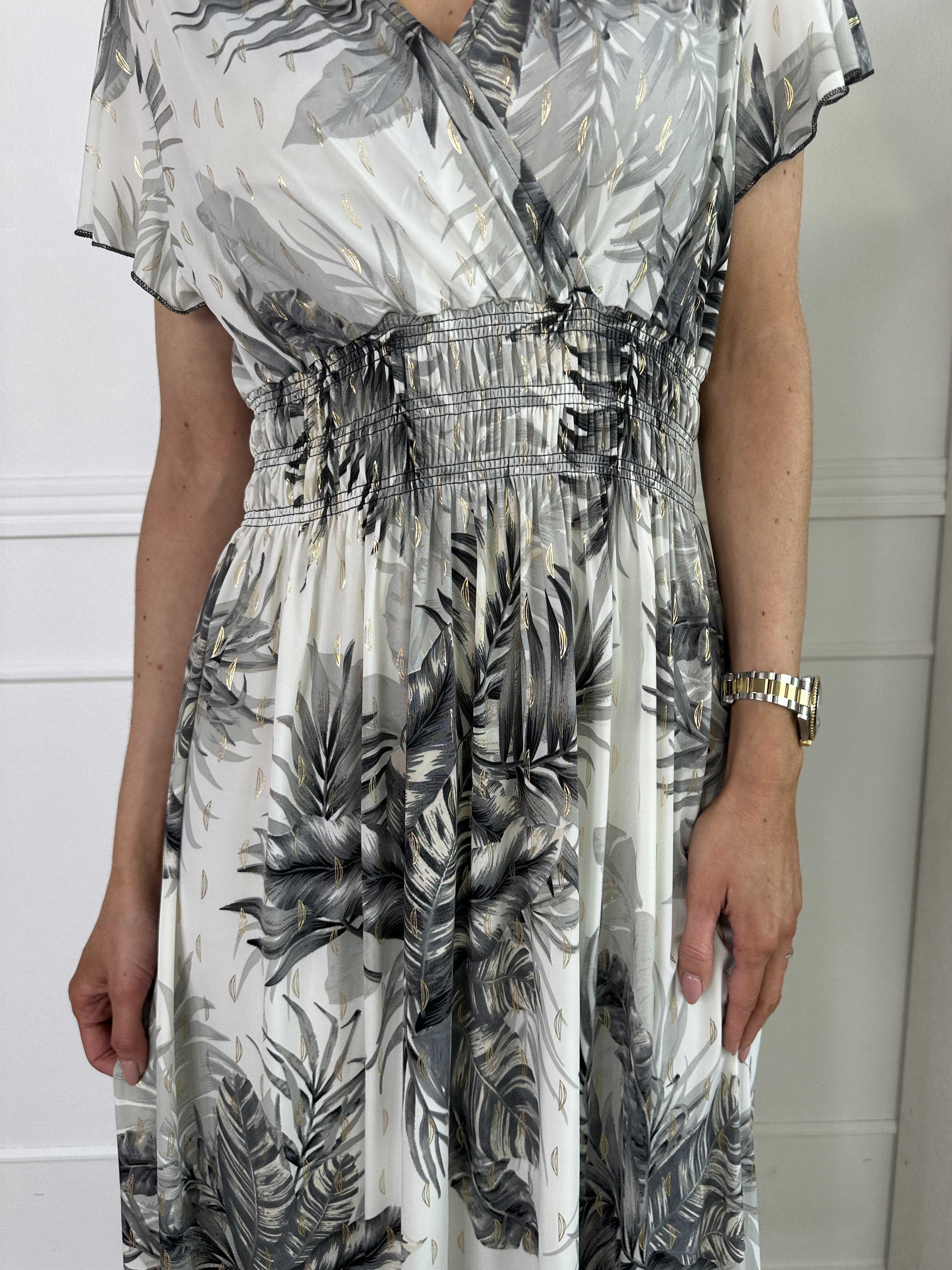 Palma - Lång elastisk klänning med blad och volangärmar