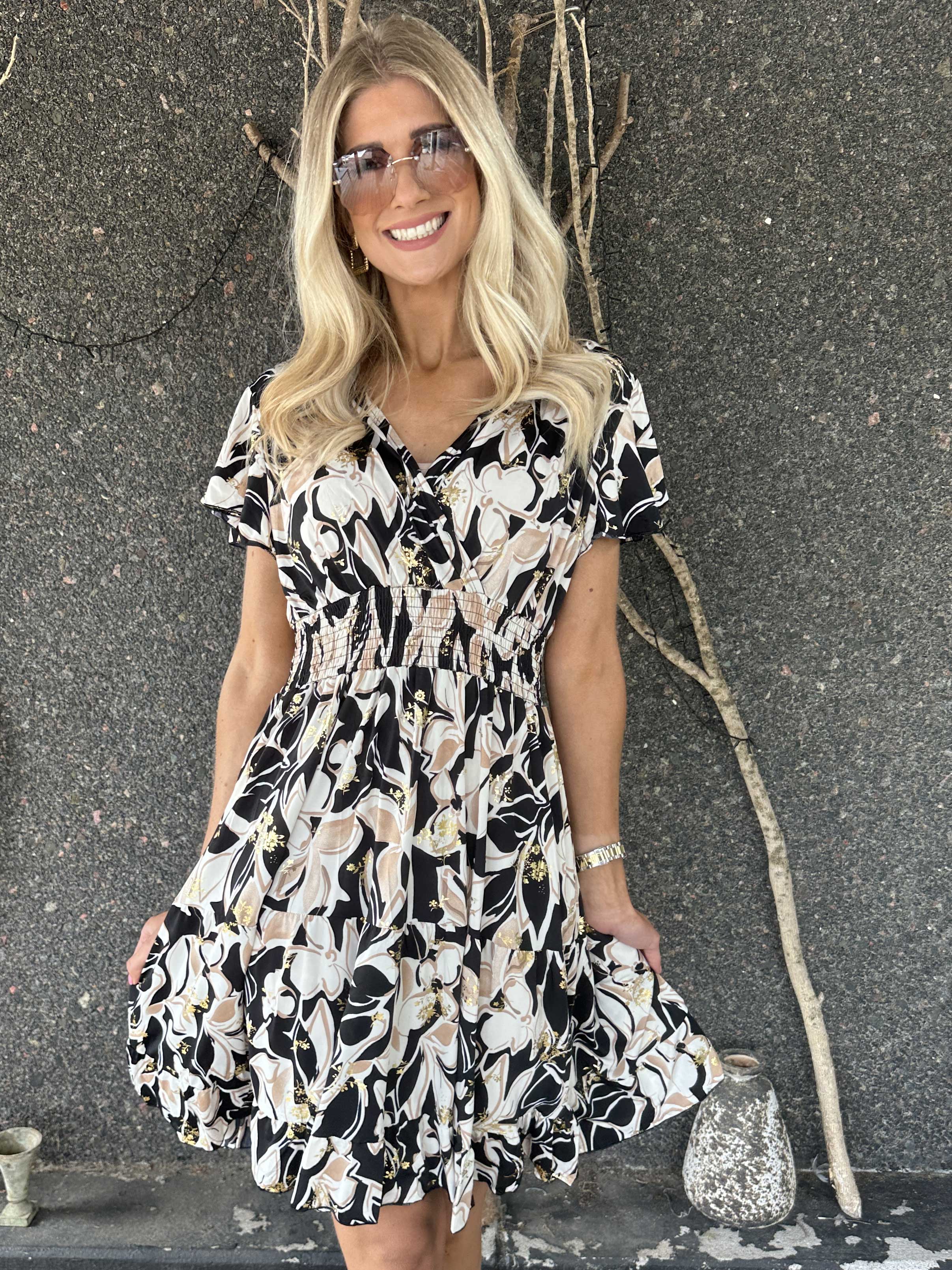 Palmira - Mönstrad elastisk klänning med lager på lager look