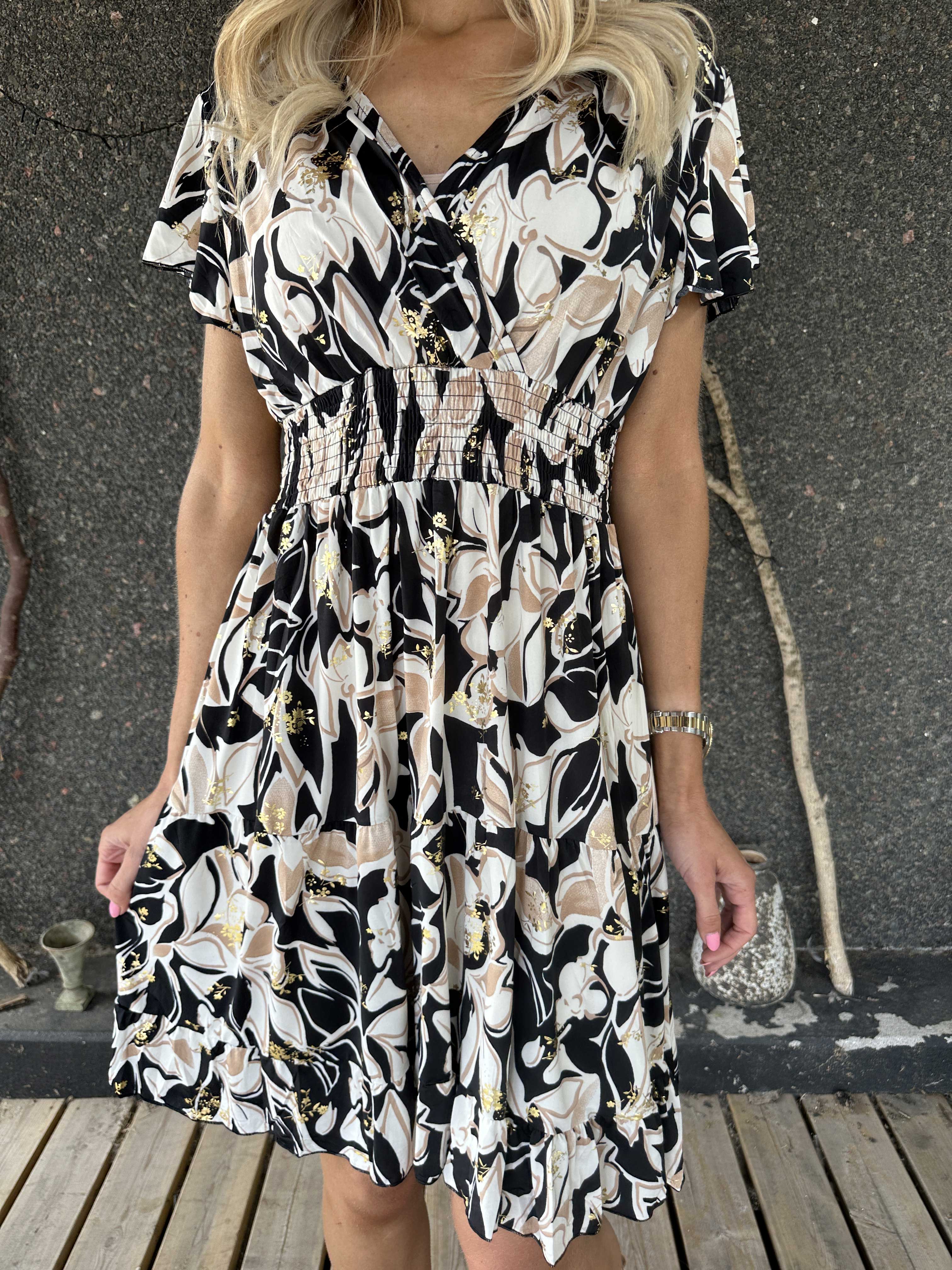 Palmira - Mönstrad elastisk klänning med lager på lager look