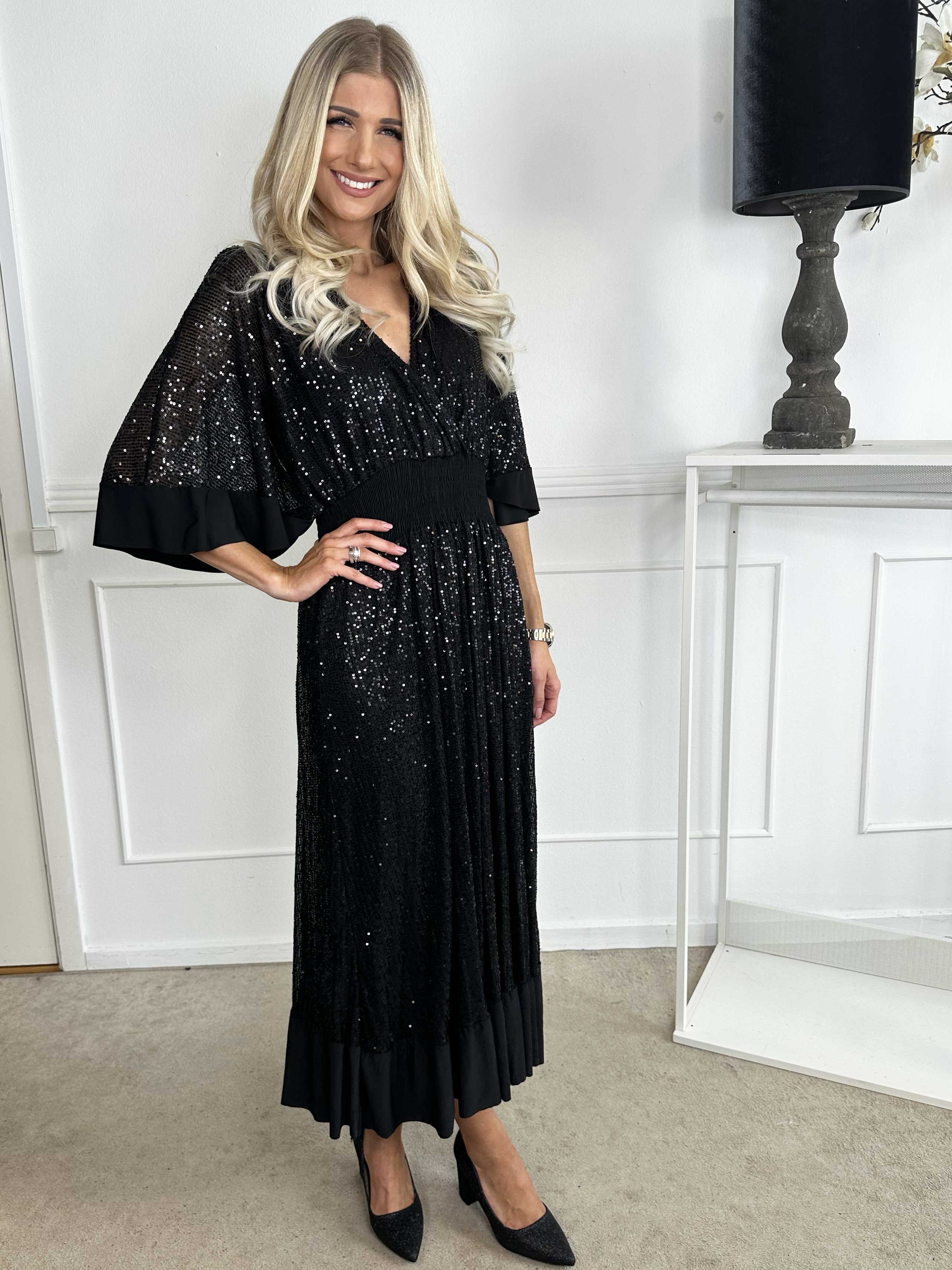 Pamela Glitter - Lång paljettklänning med volanger och smock