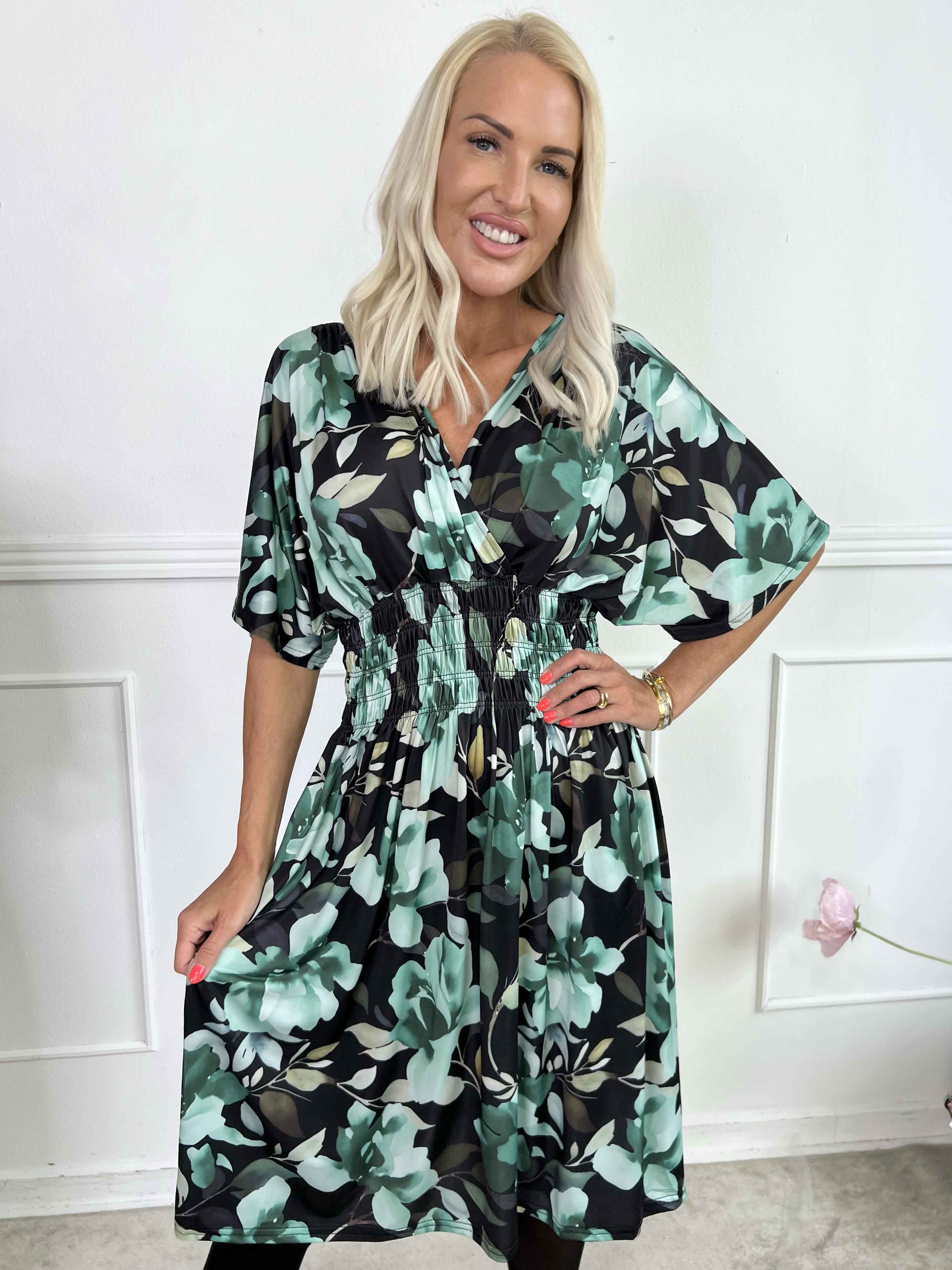 Pams Fiore Short - Kort elastisk klänning i blommigt mönster