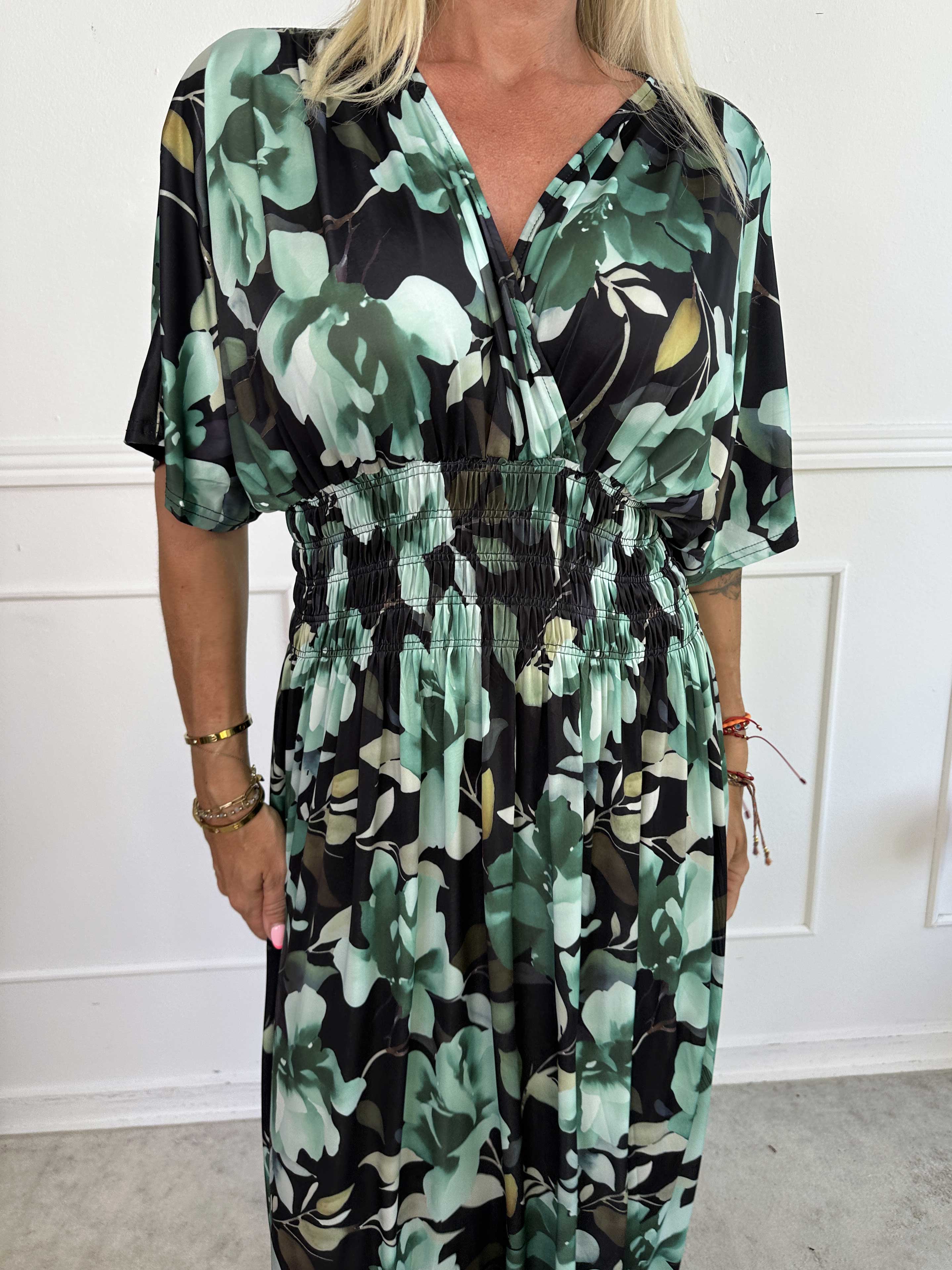 Pams Fiore - Lång elastisk klänning i blommigt mönster