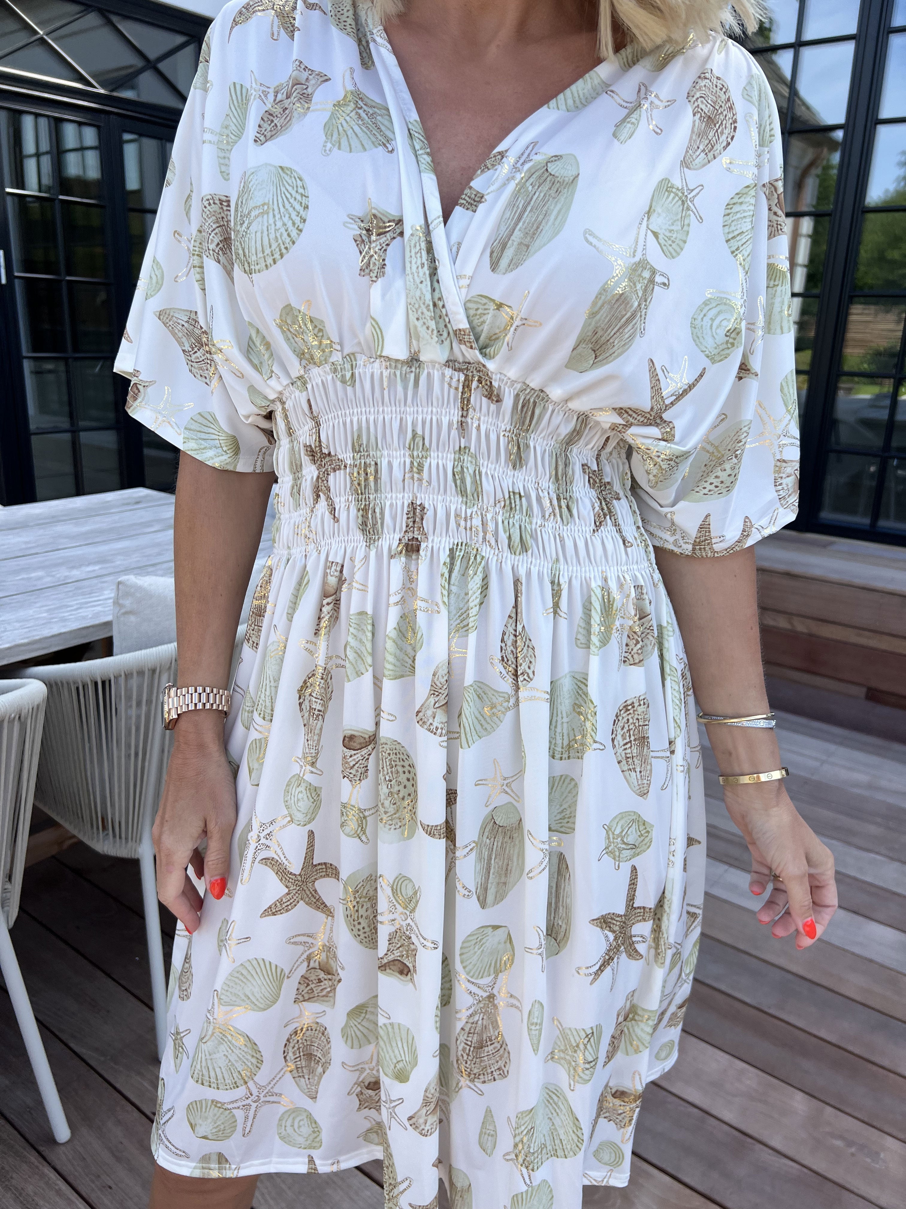 Pams Beach Short - Elastisk klänning med snäckmotiv