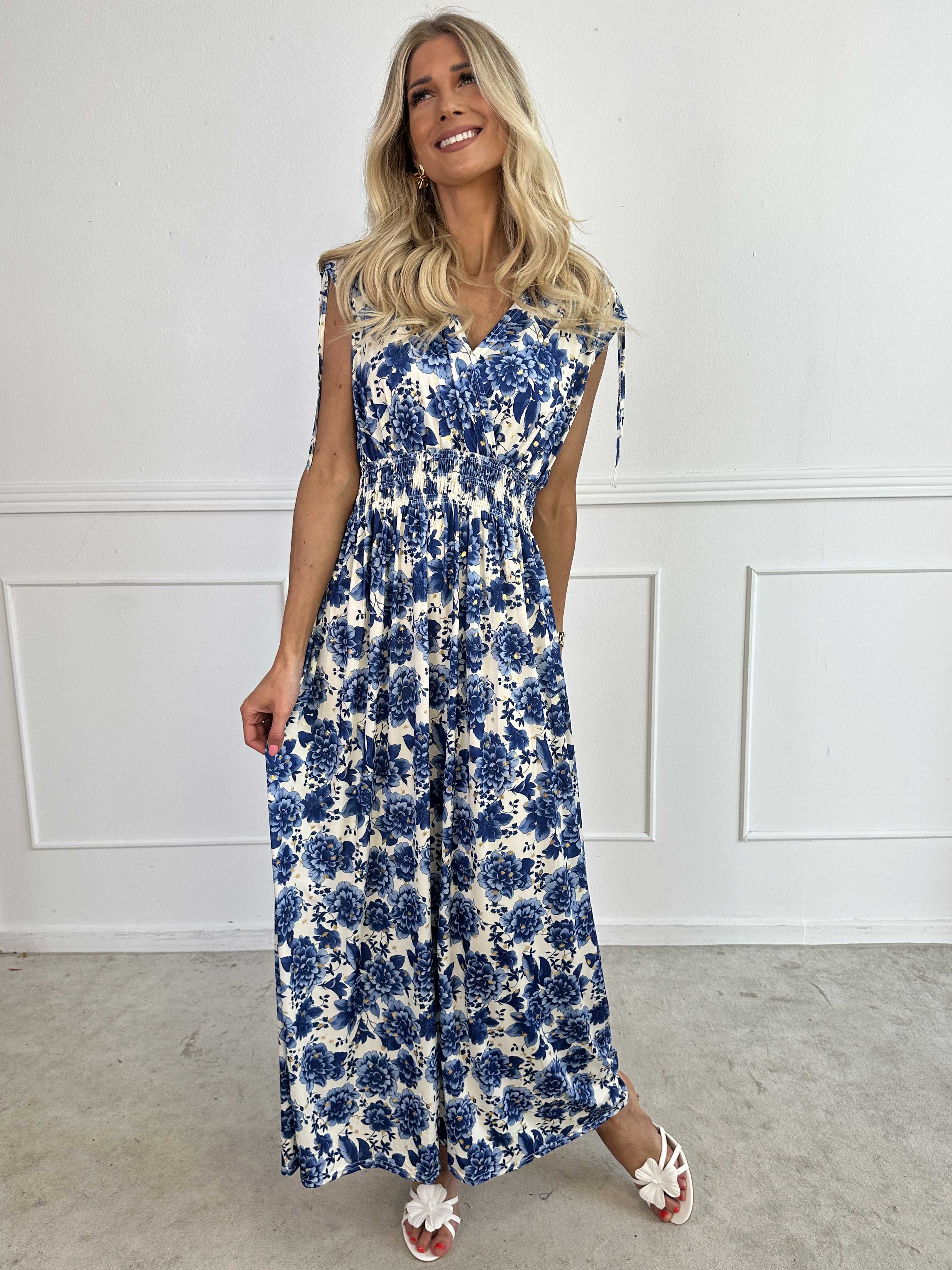 Pams Blossom Sleeveless - Lång elastisk klänning i blommigt mönster