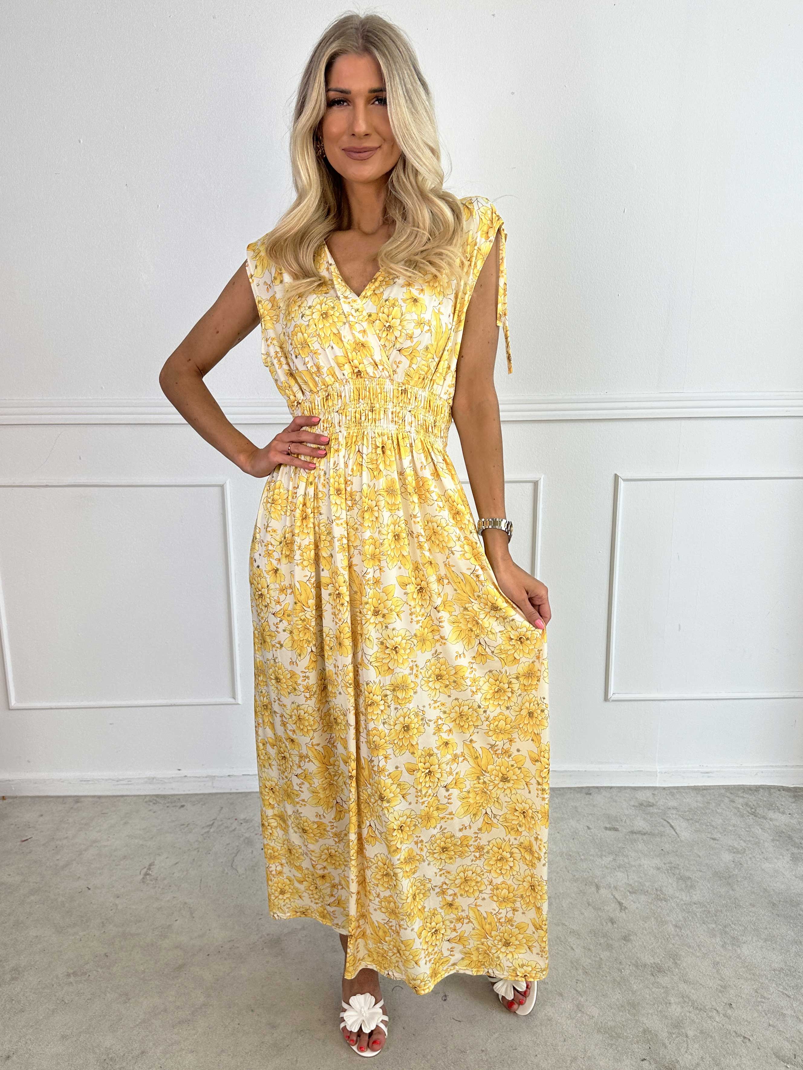 Pams Blossom Sleeveless - Lång elastisk klänning i blommigt mönster