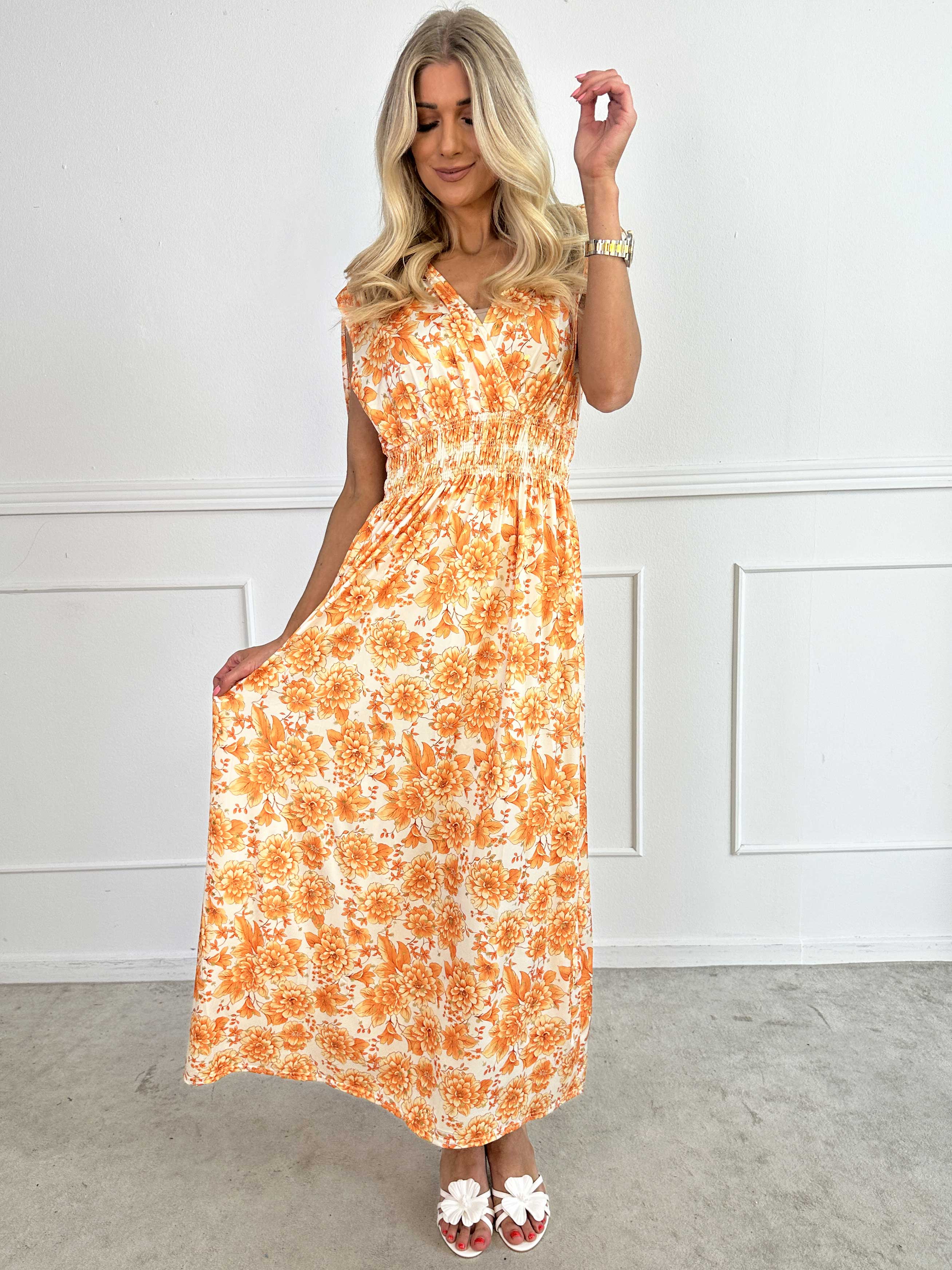 Pams Blossom Sleeveless - Lång elastisk klänning i blommigt mönster