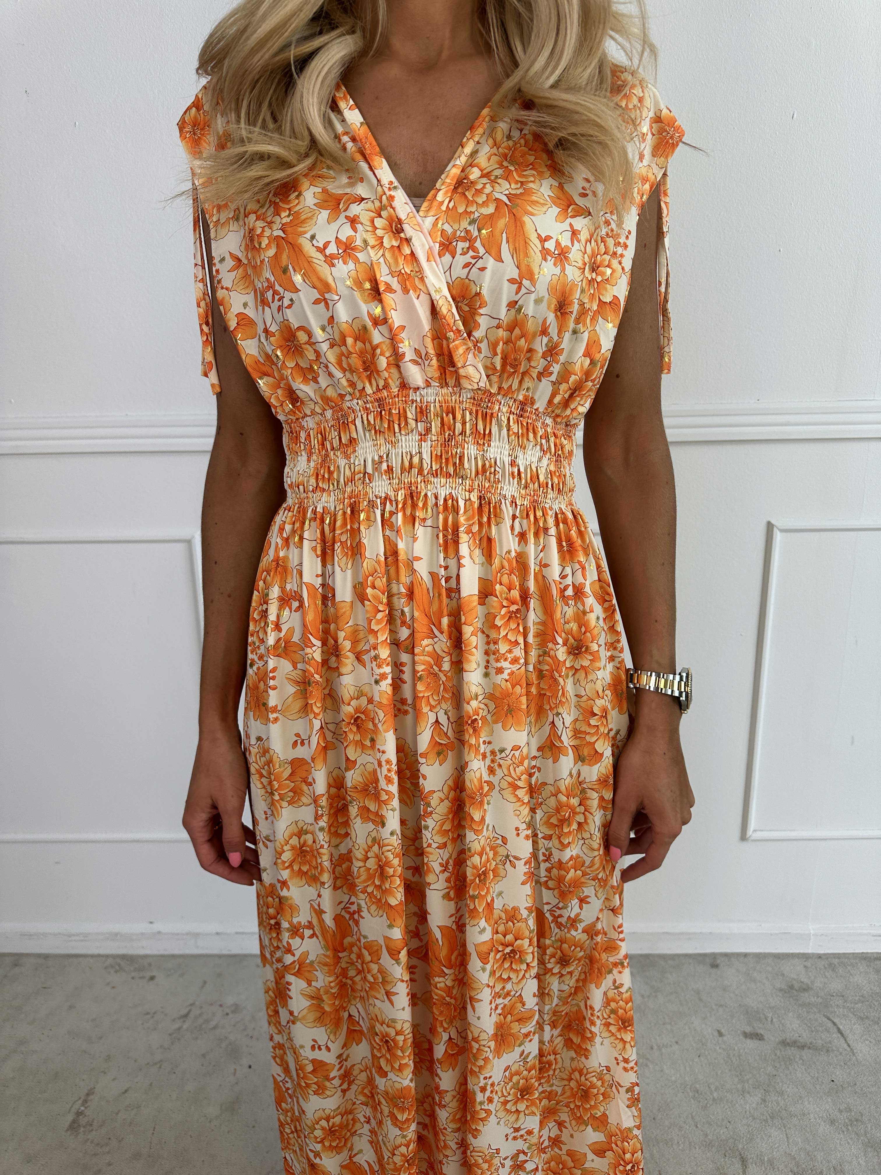 Pams Blossom Sleeveless - Lång elastisk klänning i blommigt mönster