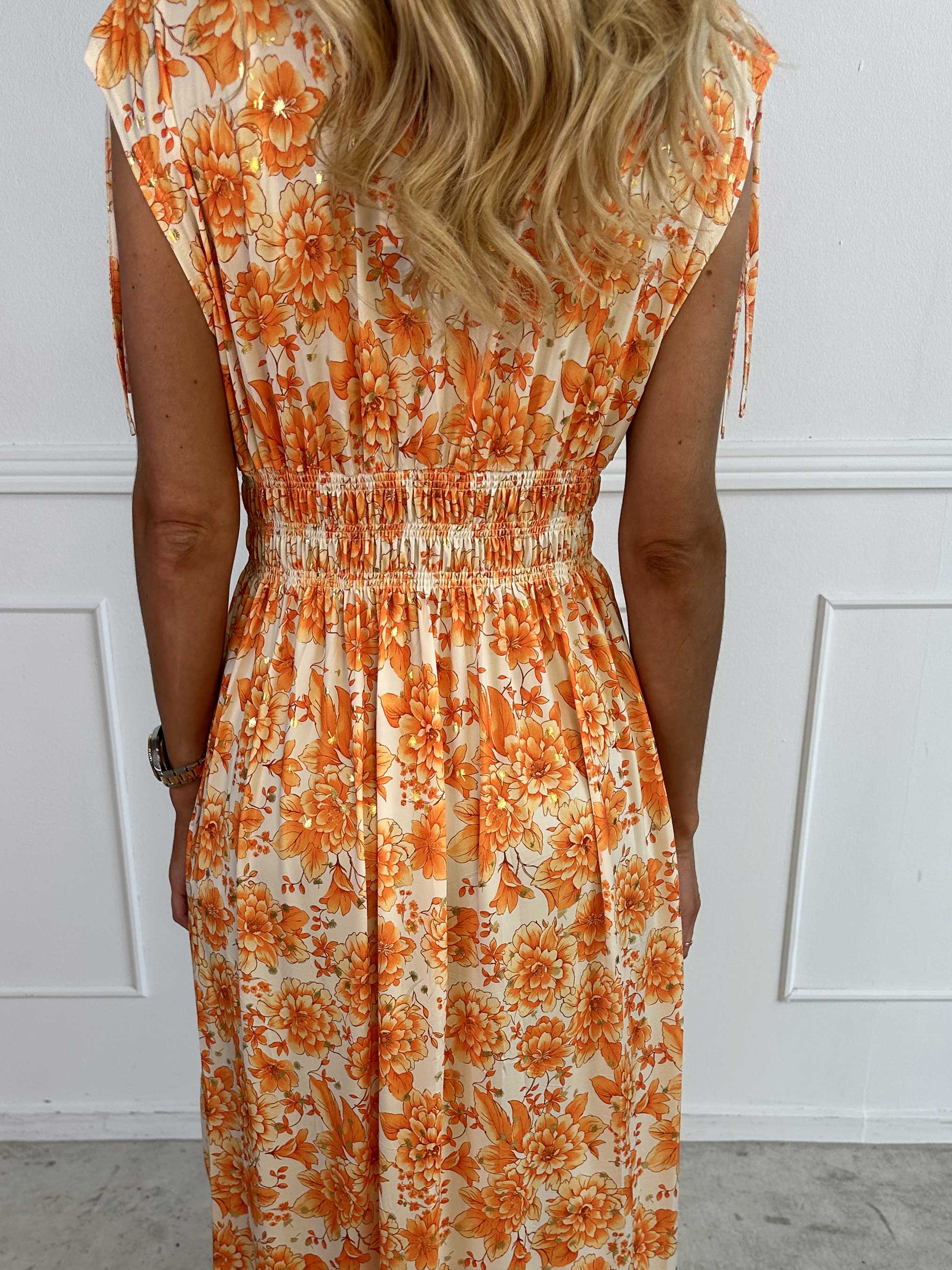 Pams Blossom Sleeveless - Lång elastisk klänning i blommigt mönster