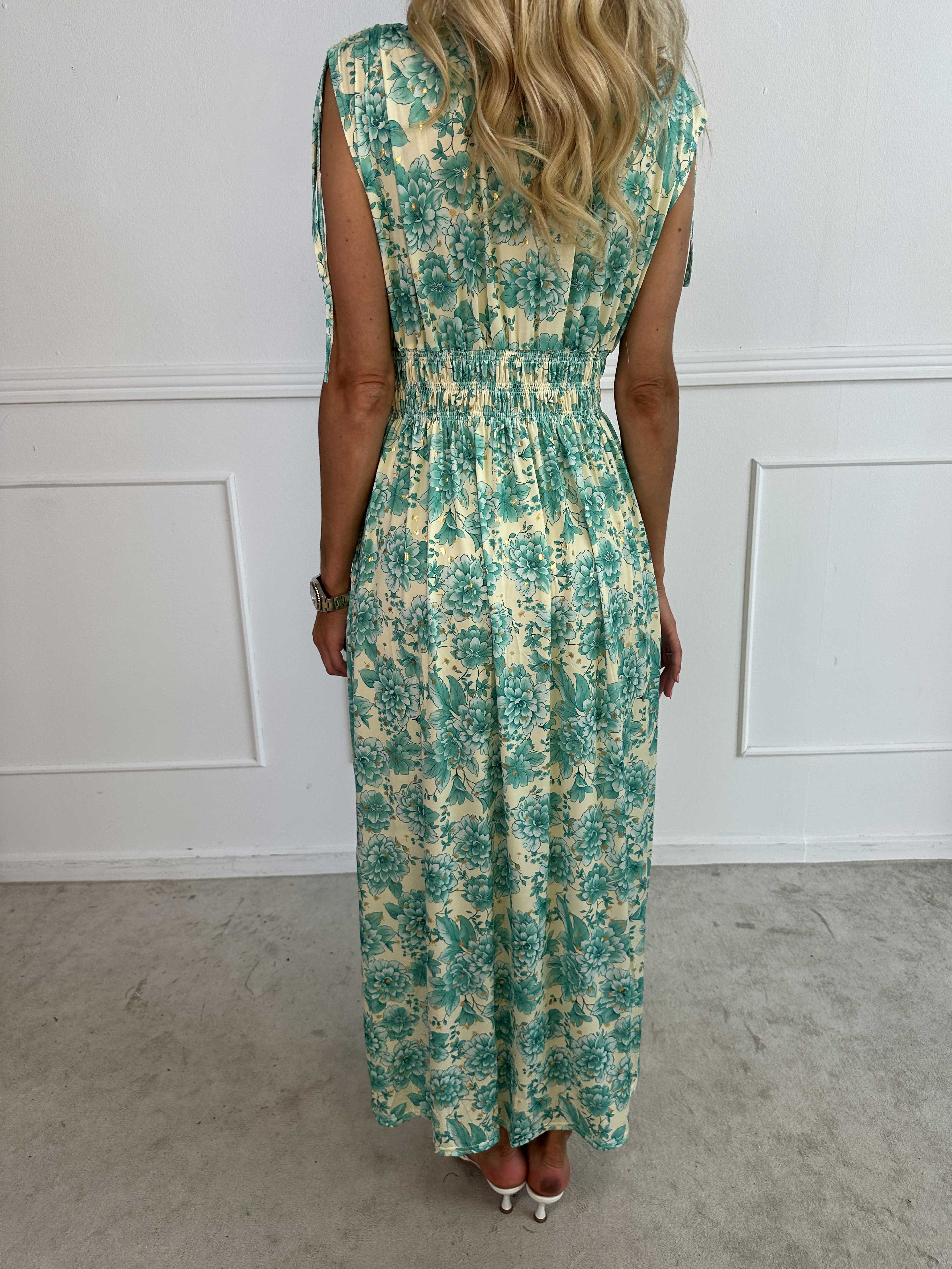 Pams Blossom Sleeveless - Lång elastisk klänning i blommigt mönster