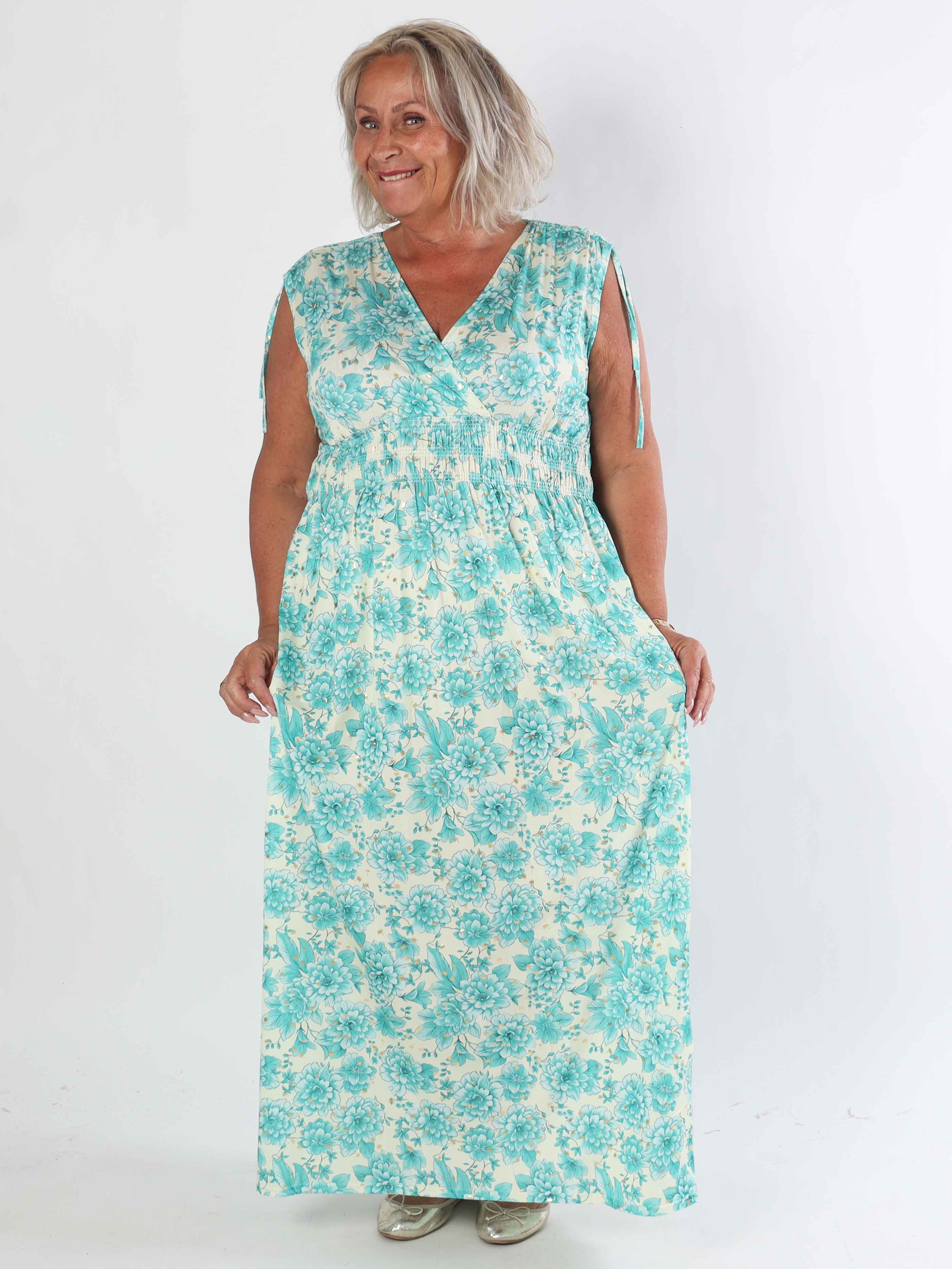 Pams Blossom Sleeveless - Lång plus size elastisk klänning i blommigt mönster