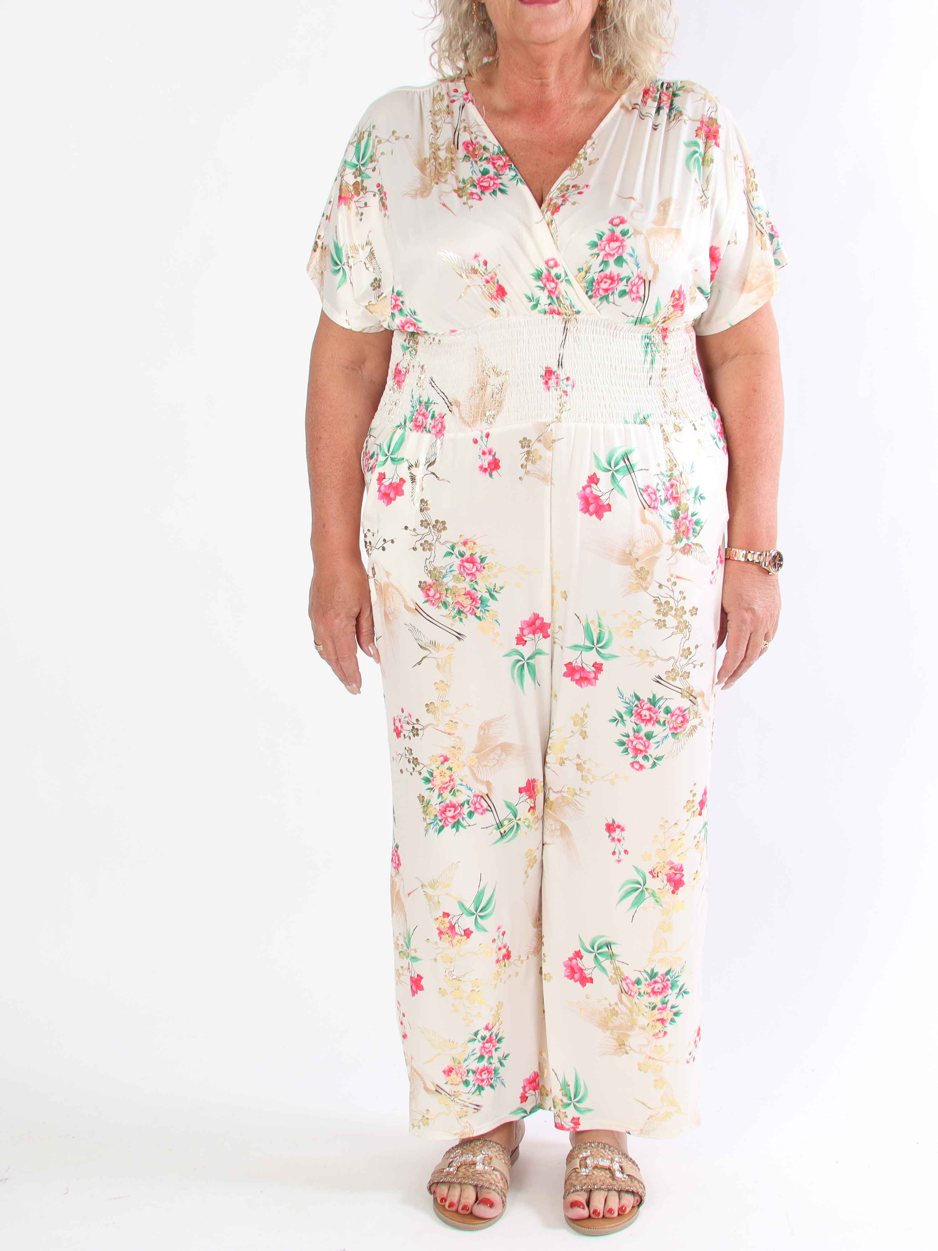 Pams Fly Jumpsuit - Elastisk plus size byxdress med blommor- och fåglemönster