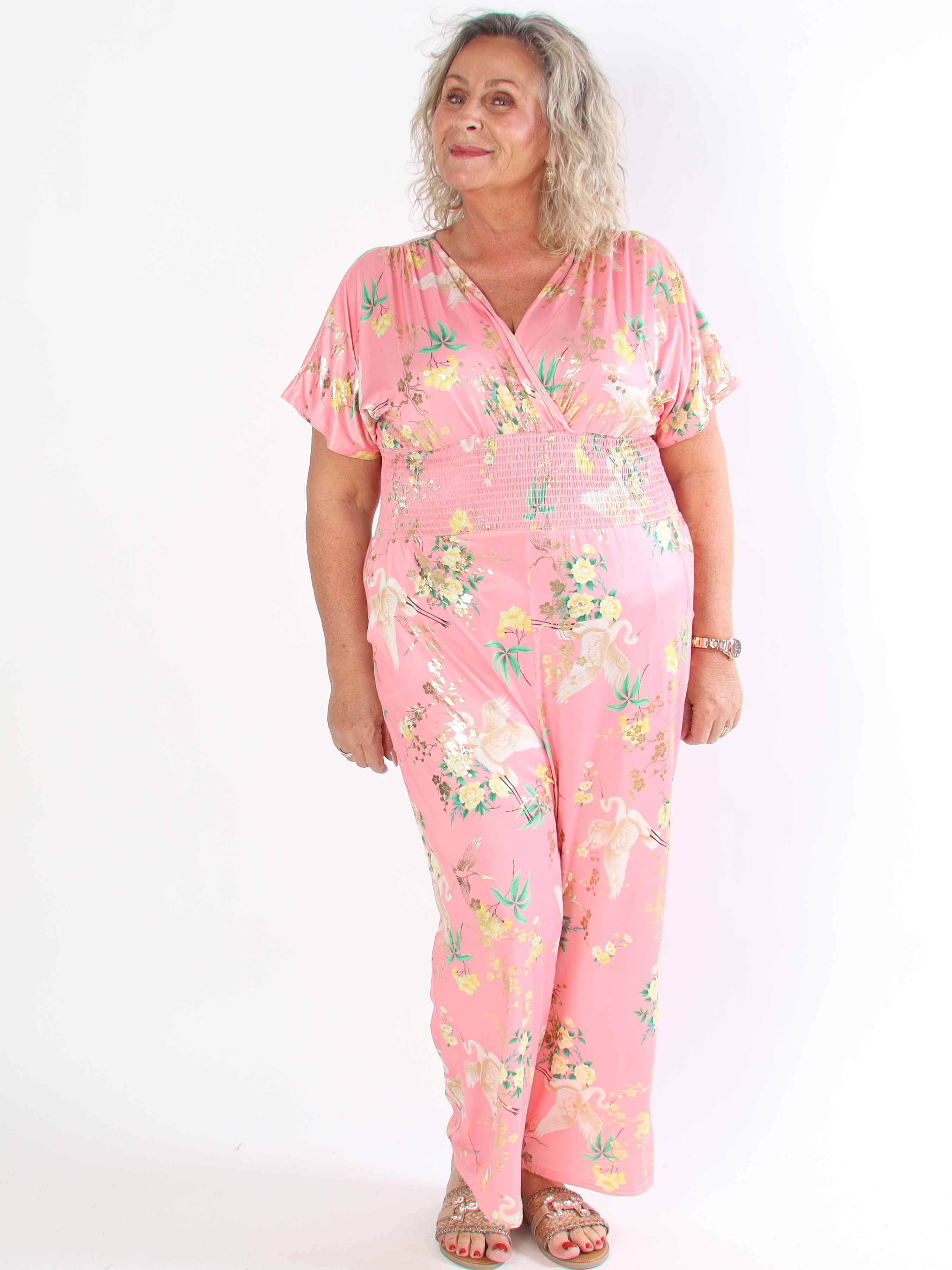 Pams Fly Jumpsuit - Elastisk plus size byxdress med blommor- och fåglemönster