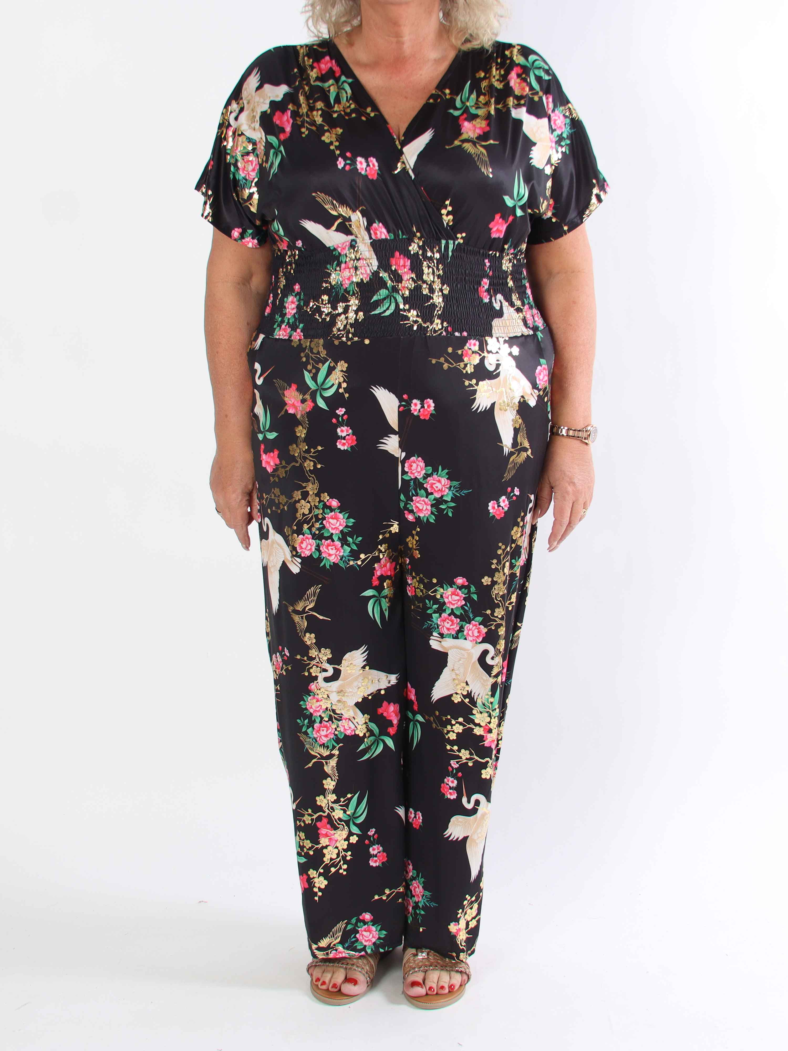 Pams Fly Jumpsuit - Elastisk plus size byxdress med blommor- och fåglemönster