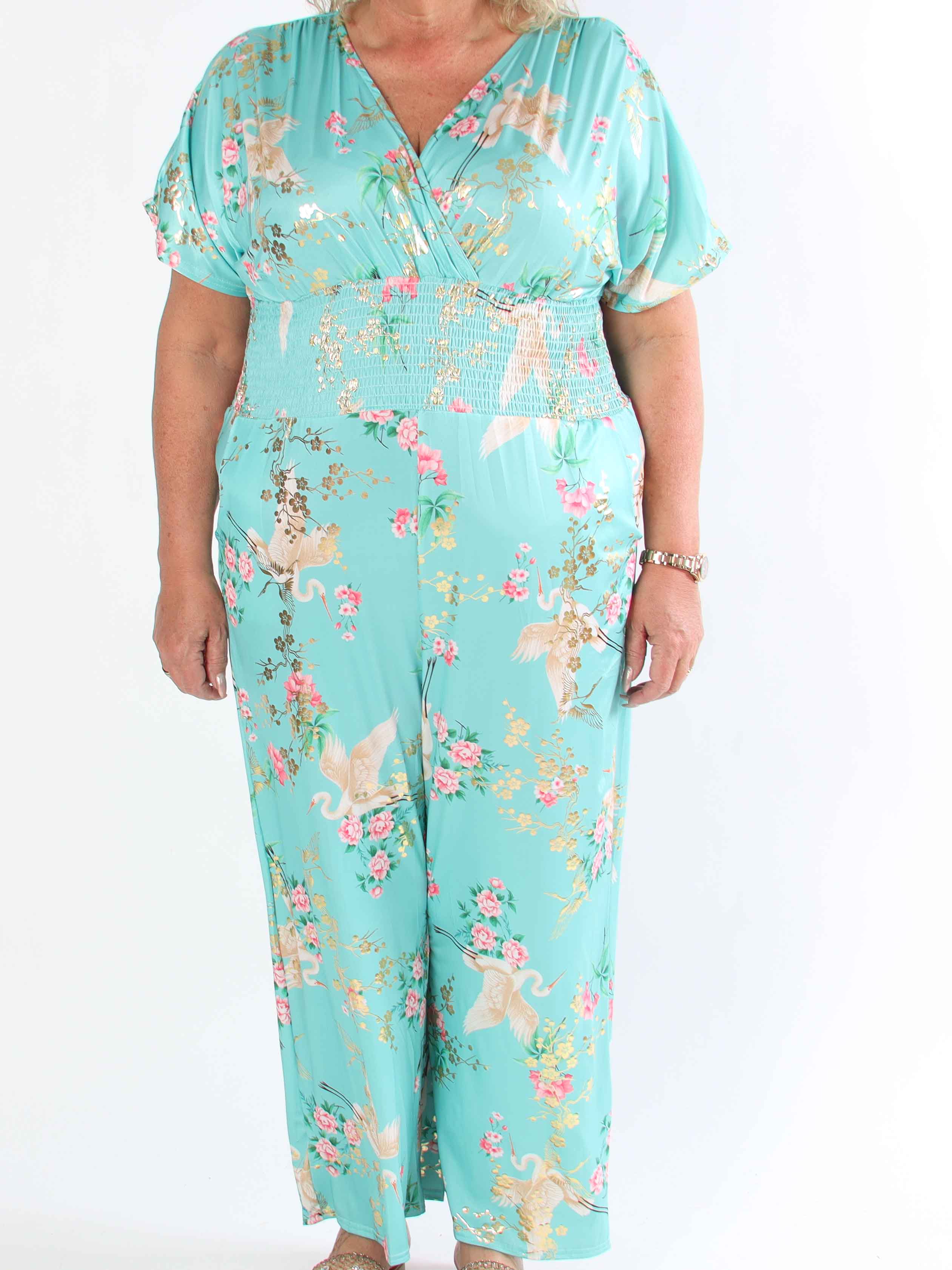 Pams Fly Jumpsuit - Elastisk plus size byxdress med blommor- och fåglemönster