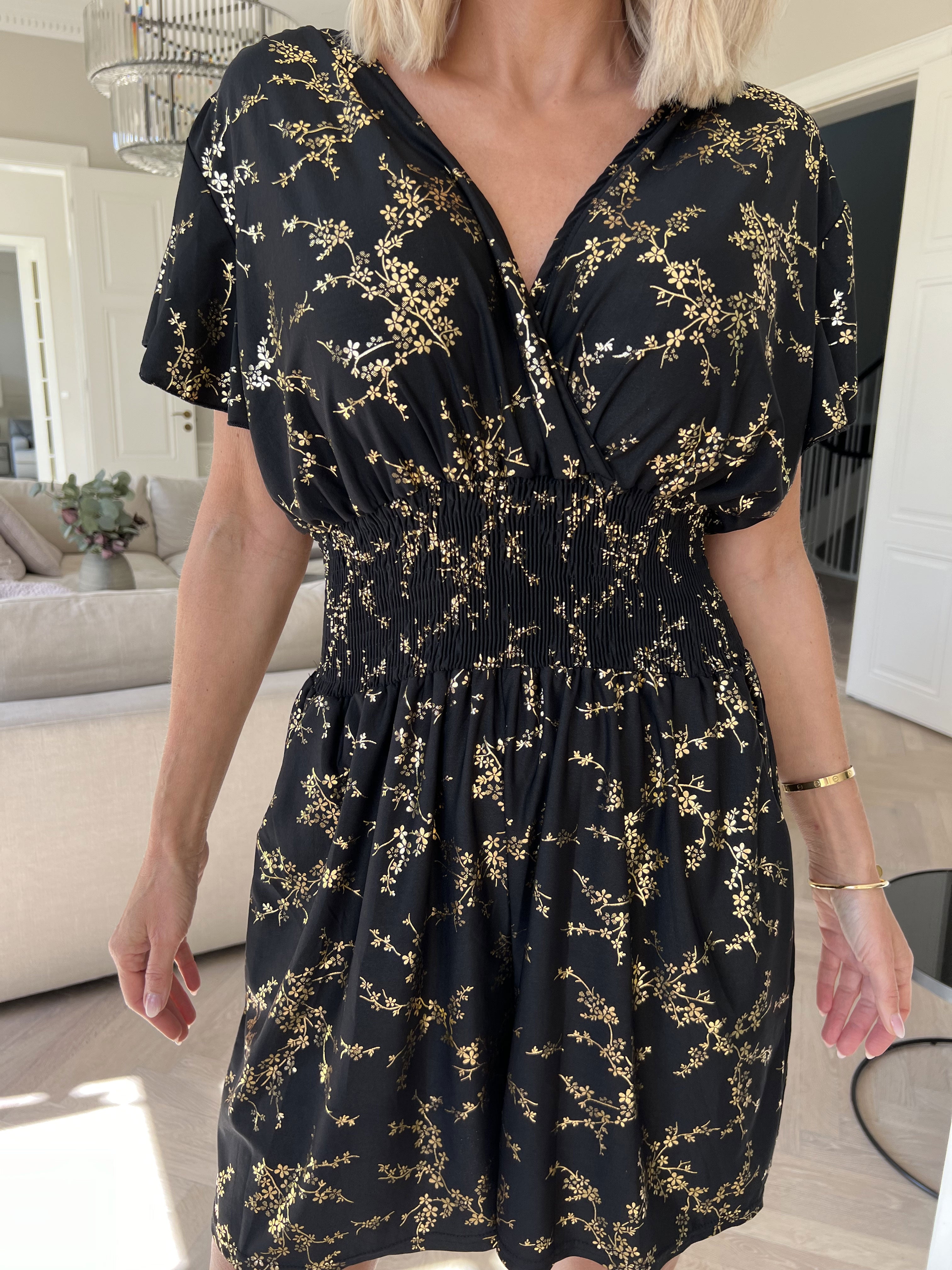 Pams Gold Playsuit - Jumpsuit med resår och guldtryck