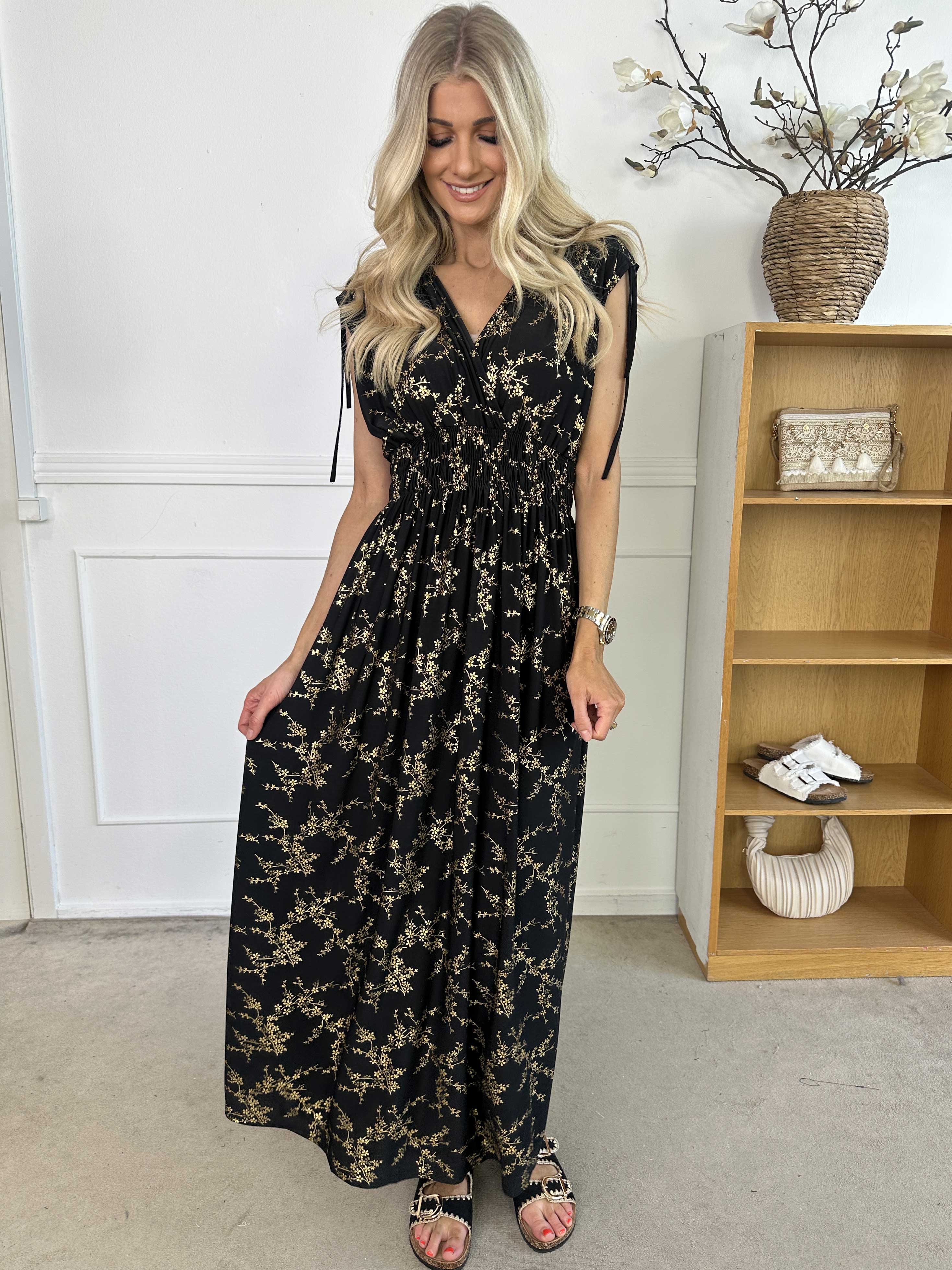 Pams Gold Sleeveless - Lång elastisk klänning med guldtryck