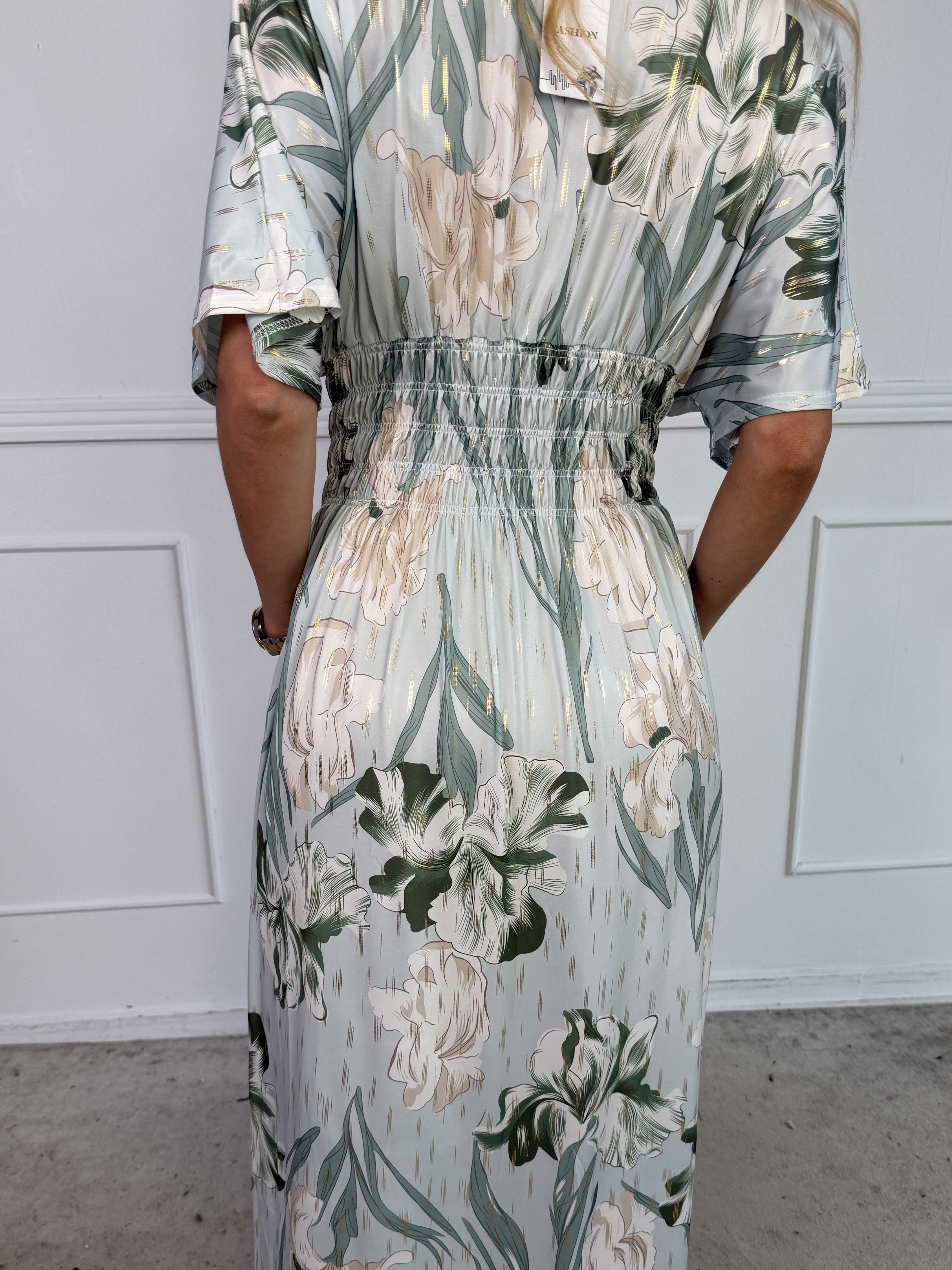 Pams Kvitka - Lång, stretchig blommig klänning med gulddetaljer och fickor