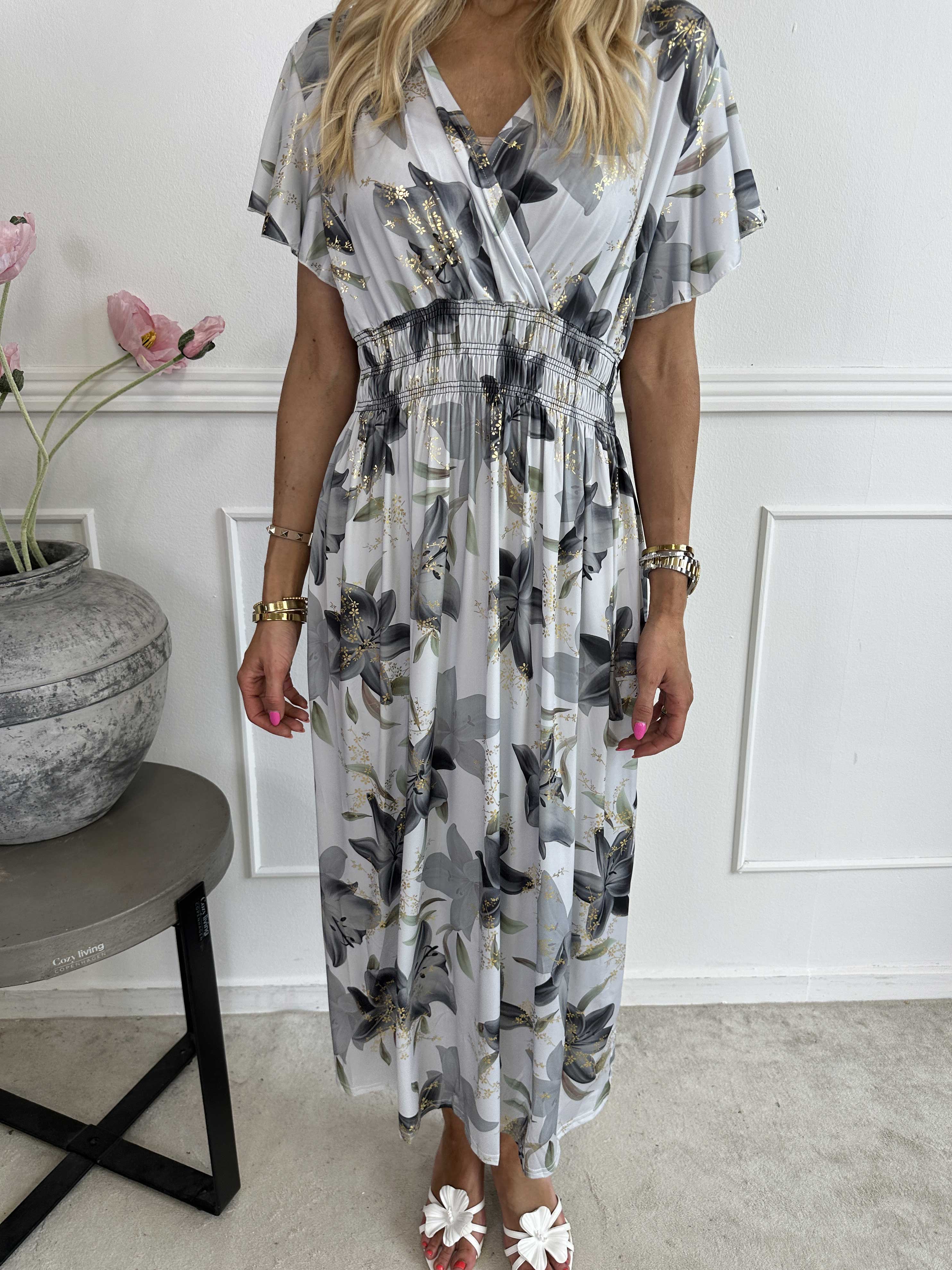 Pams Lilies - Elastisk klänning med liljemönster och gulddetaljer