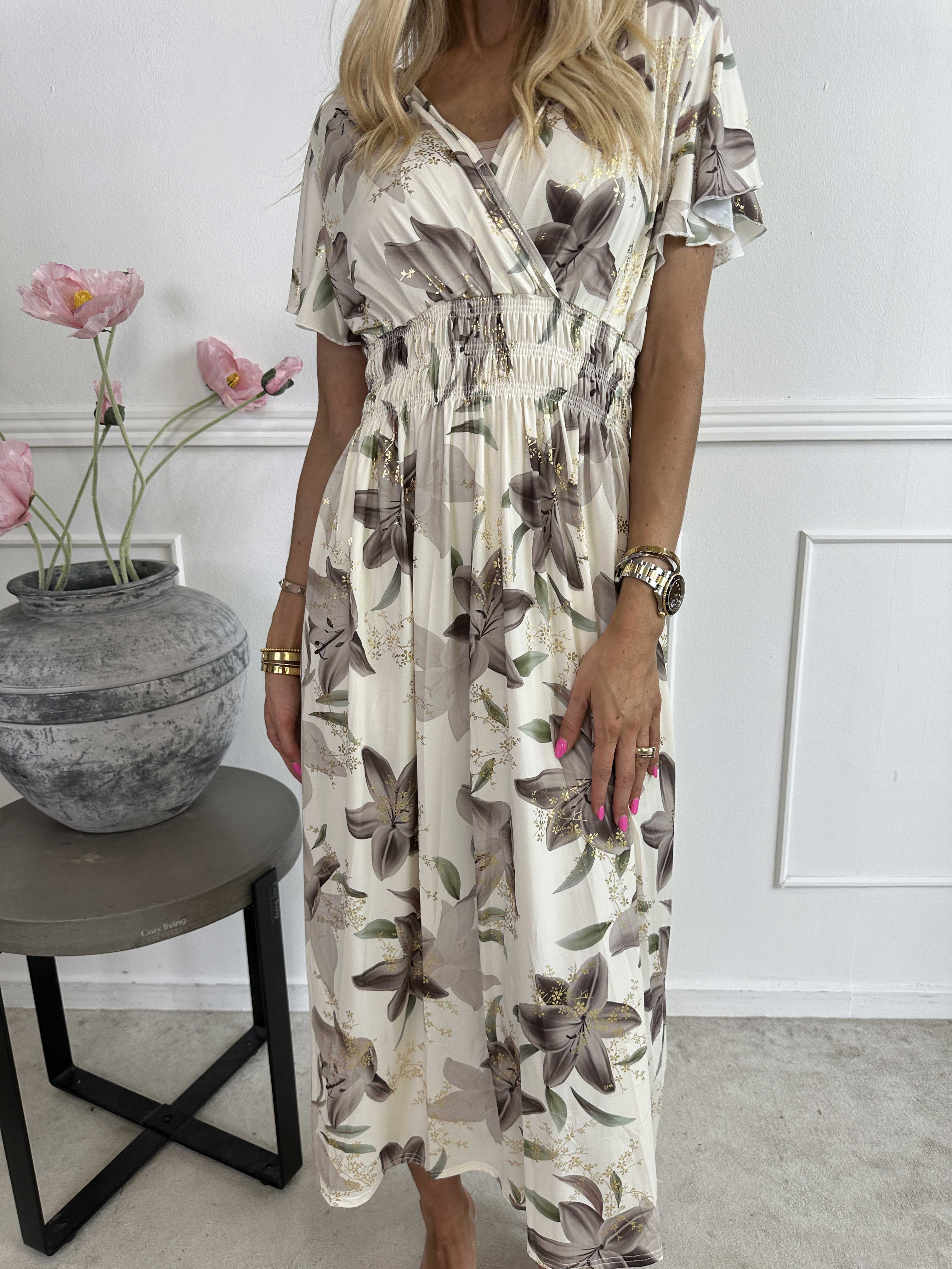 Pams Lilies - Elastisk klänning med liljemönster och gulddetaljer