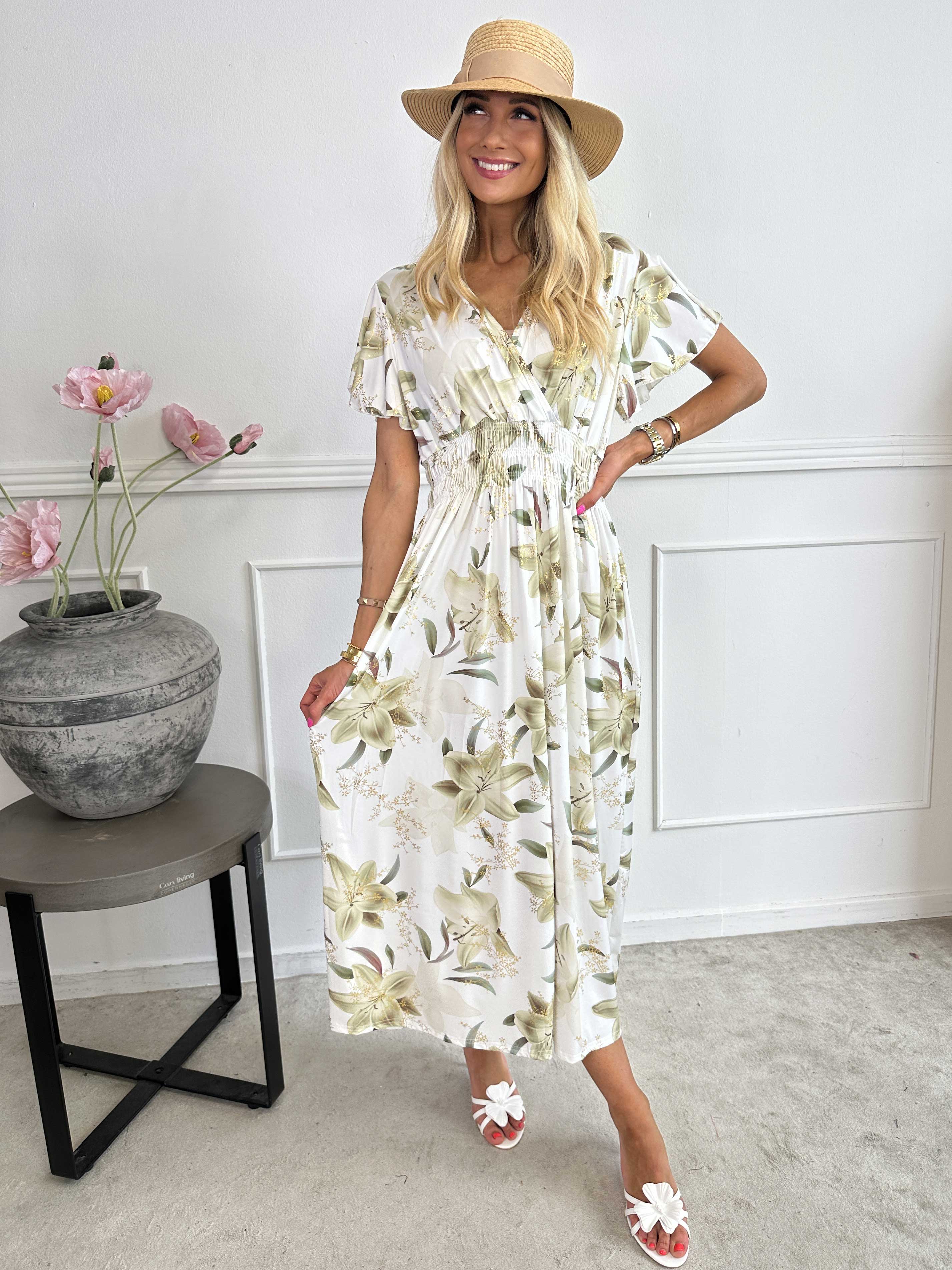 Pams Lilies - Elastisk klänning med liljemönster och gulddetaljer