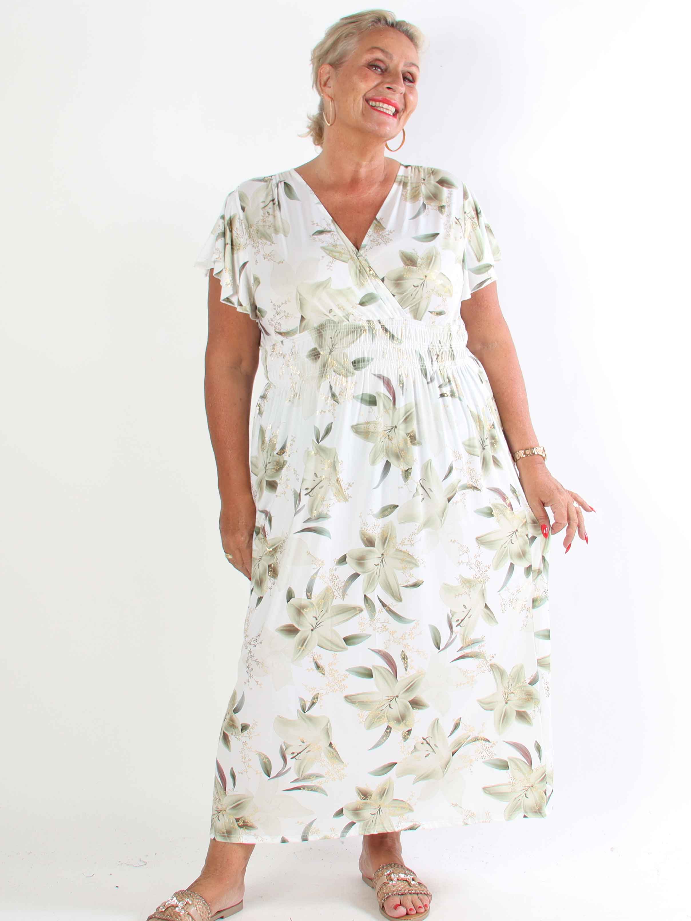 Pams Lilies - Elastisk plus size klänning med liljemönster och gulddetaljer