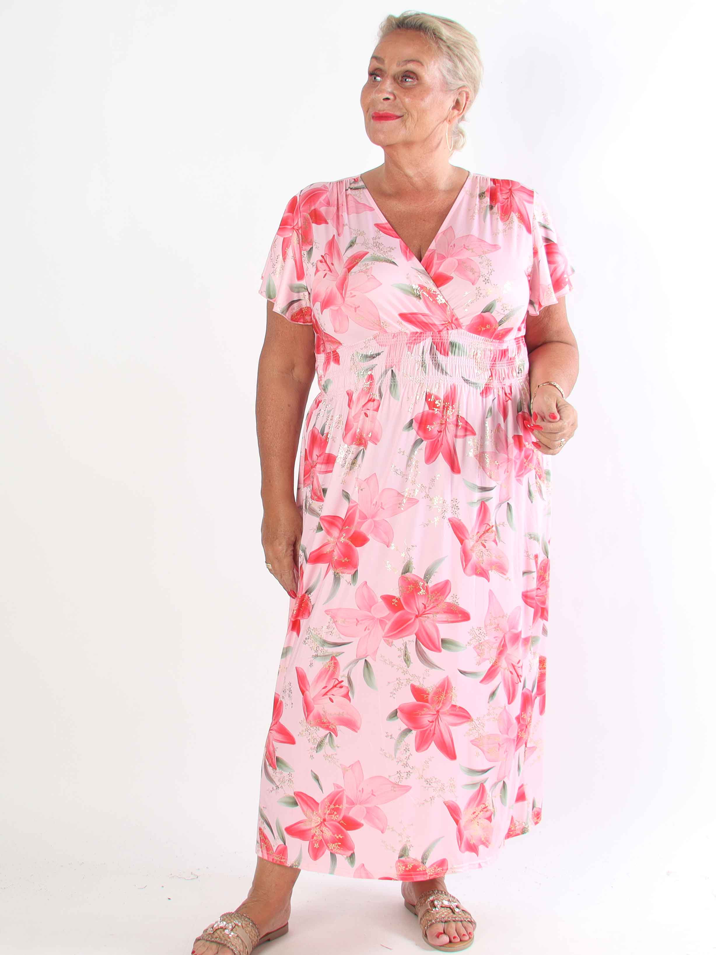 Pams Lilies - Elastisk plus size klänning med liljemönster och gulddetaljer