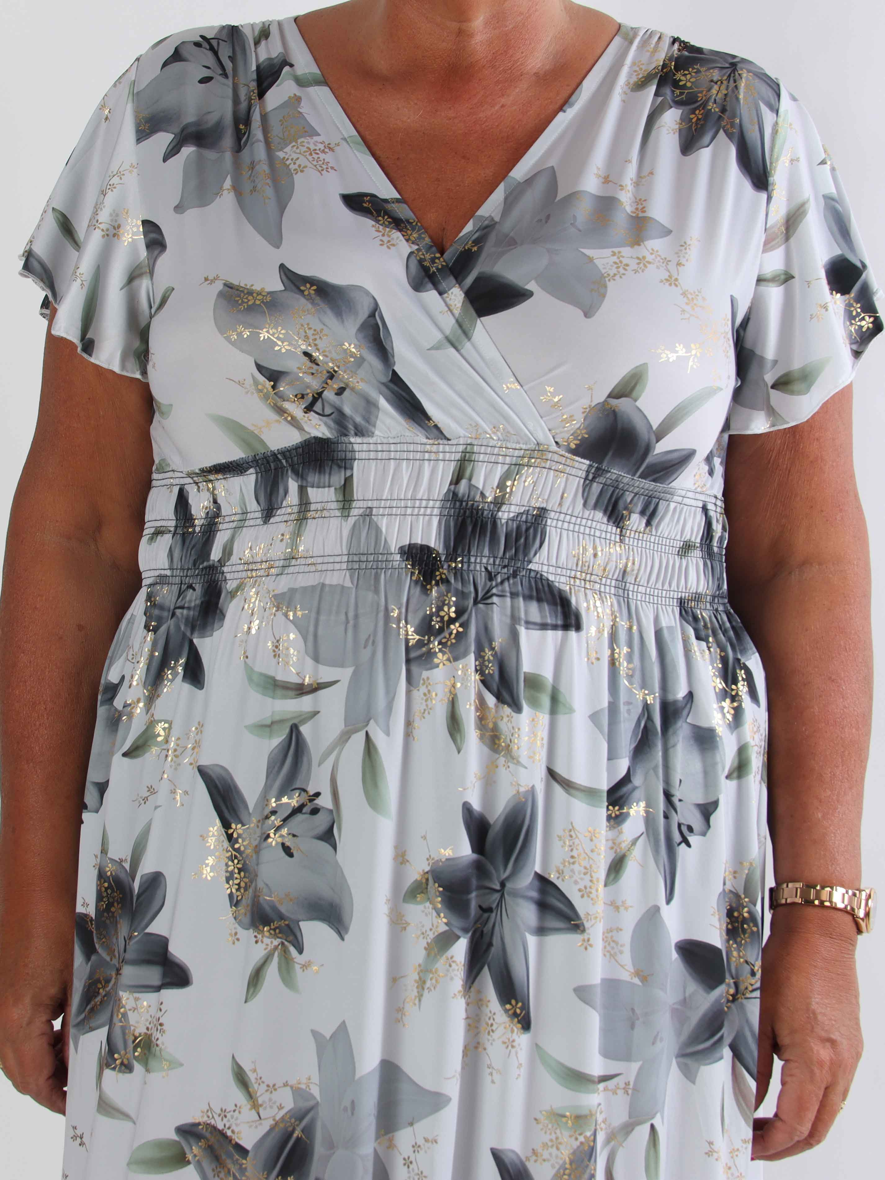 Pams Lilies - Elastisk plus size klänning med liljemönster och gulddetaljer