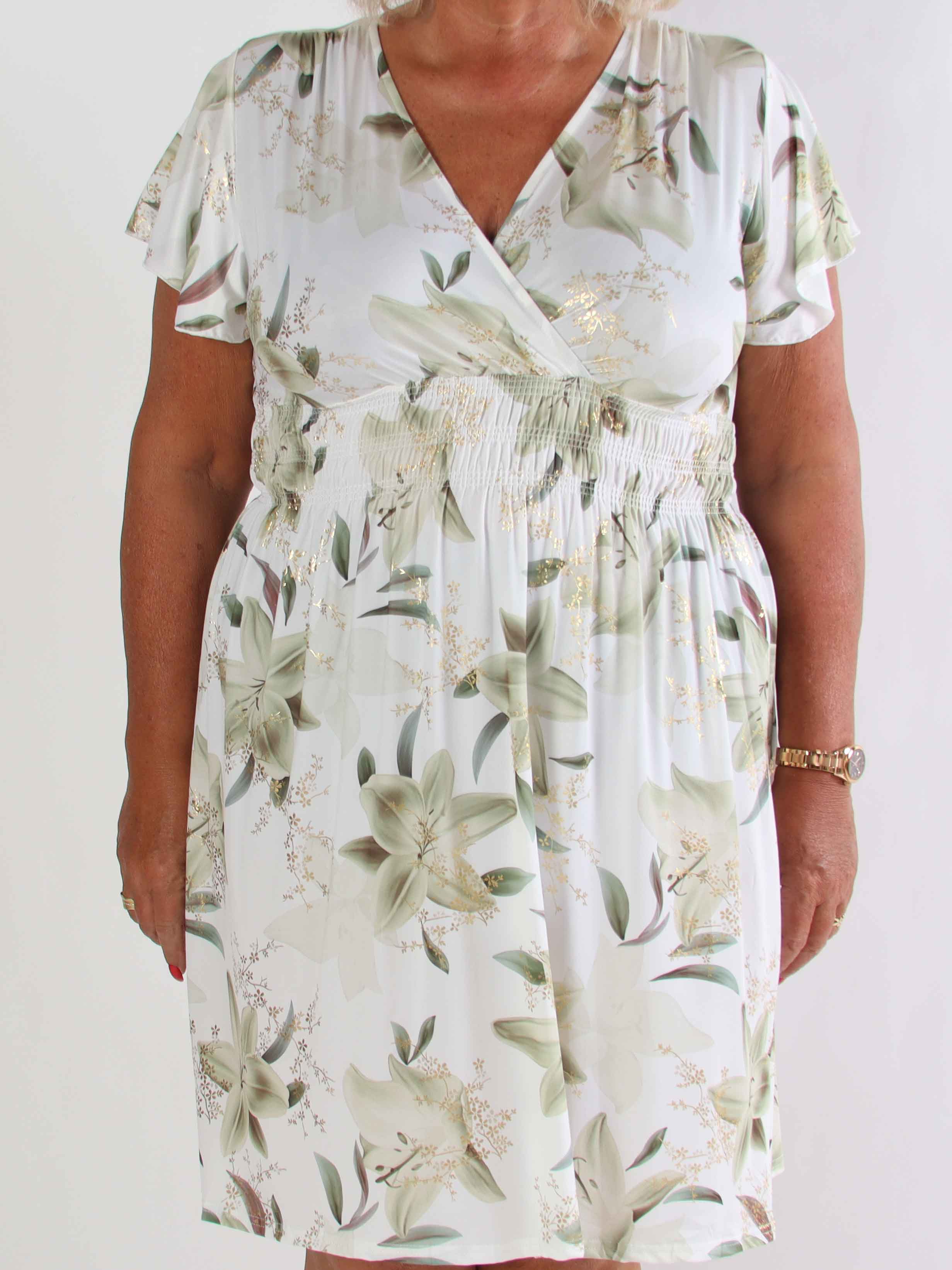 Pams Lilies Short - Kort elastisk plus size klänning med liljemönster och gulddetaljer