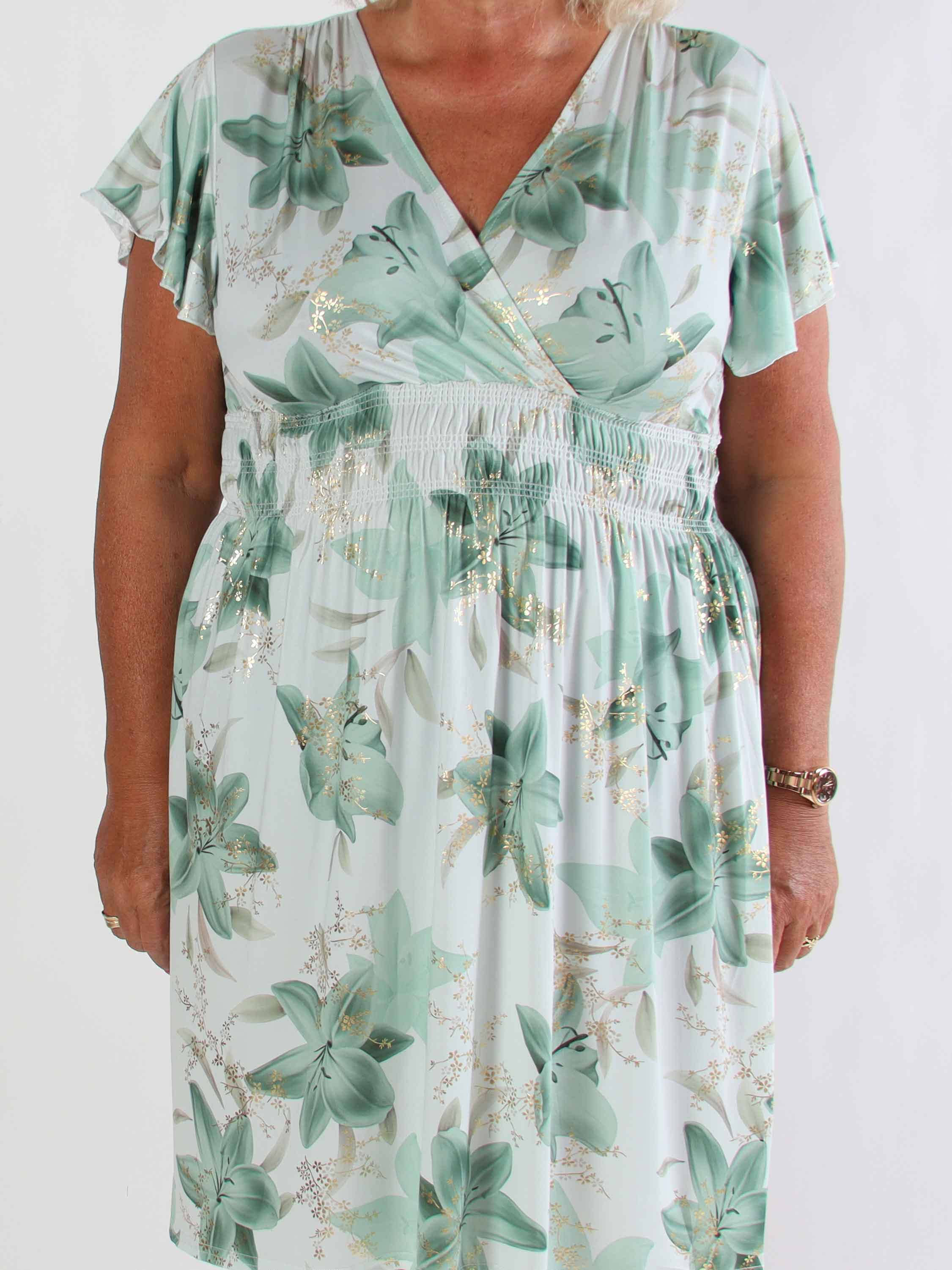 Pams Lilies Short - Kort elastisk plus size klänning med liljemönster och gulddetaljer