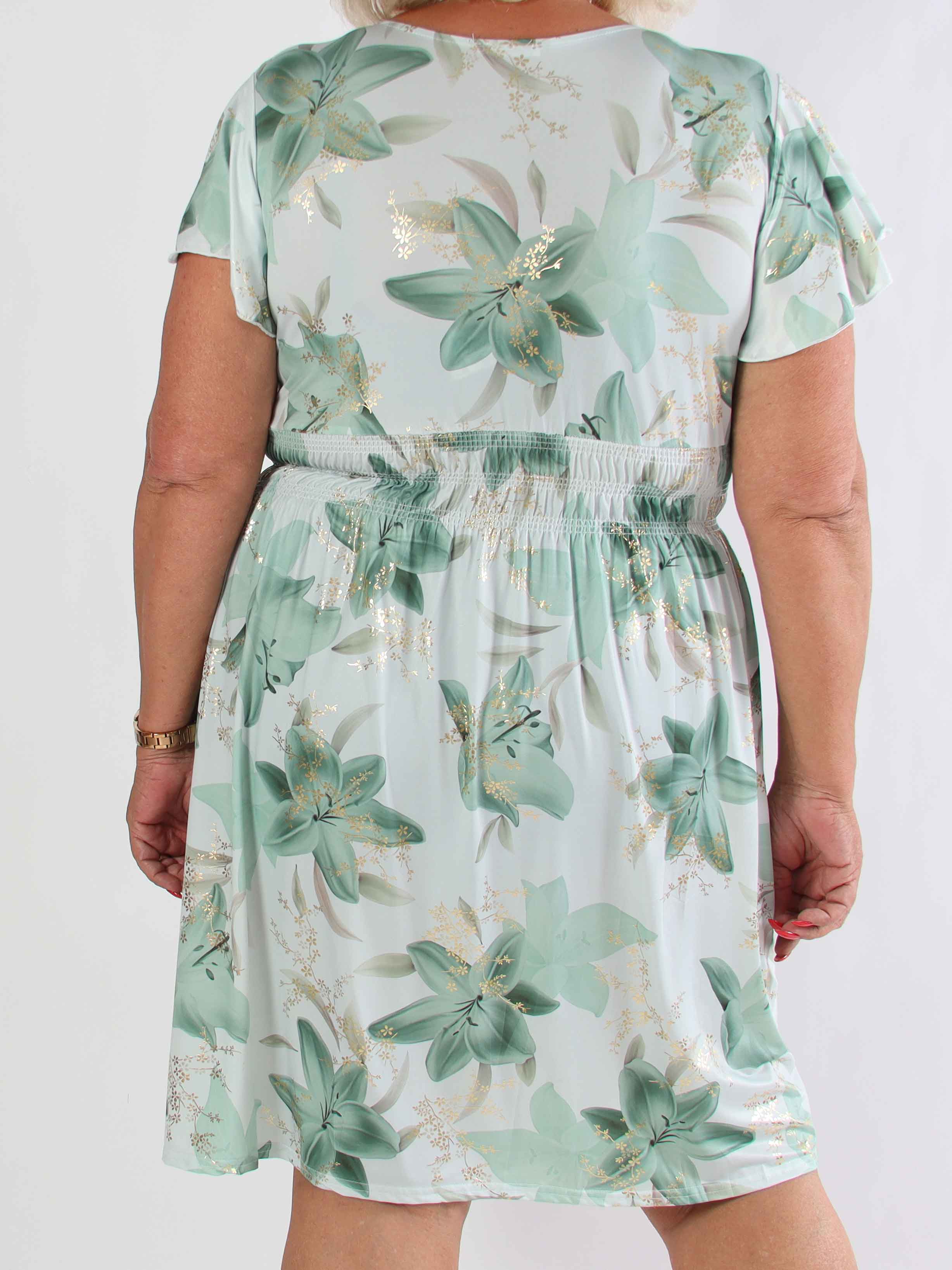 Pams Lilies Short - Kort elastisk plus size klänning med liljemönster och gulddetaljer