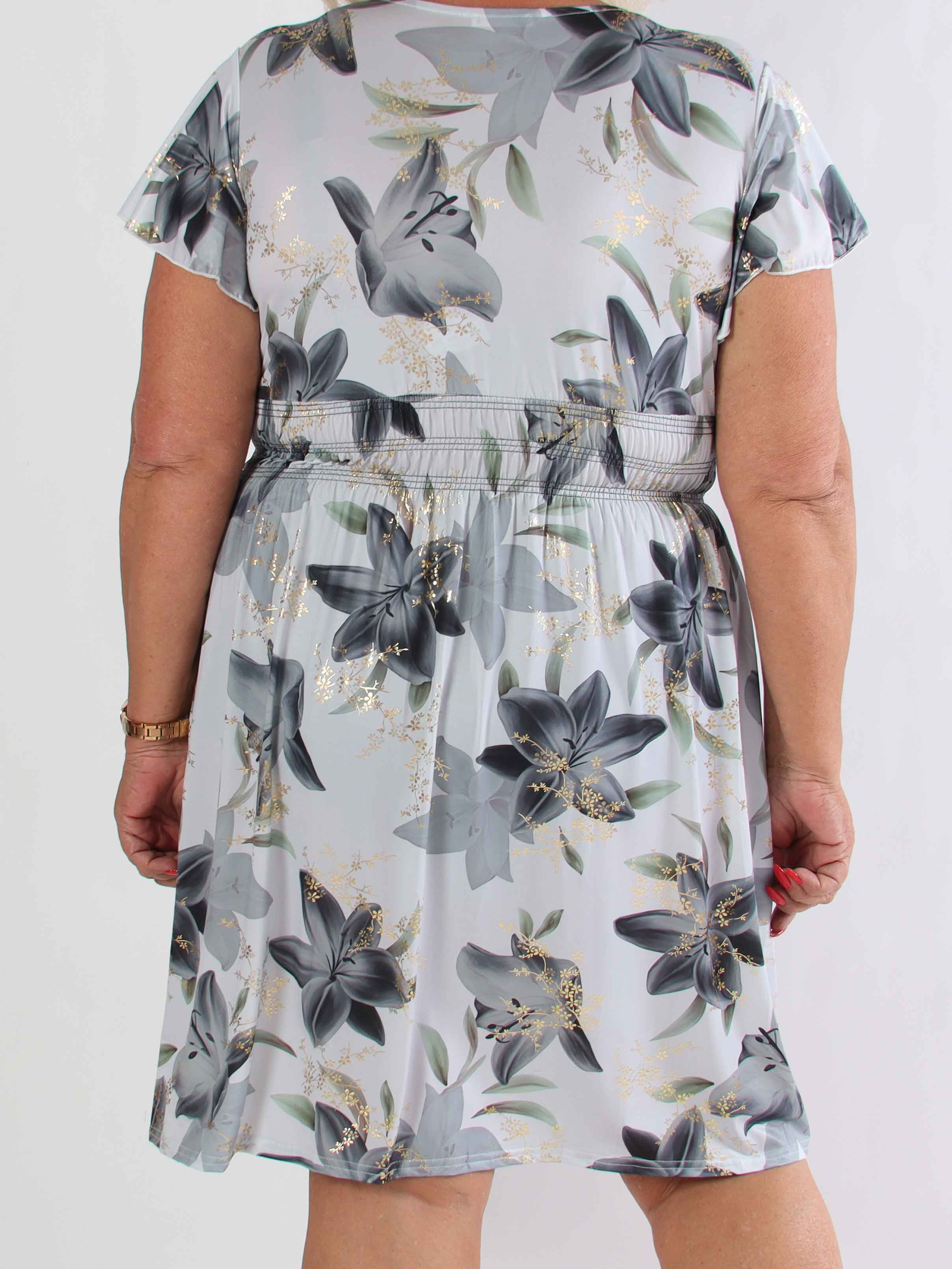 Pams Lilies Short - Kort elastisk plus size klänning med liljemönster och gulddetaljer