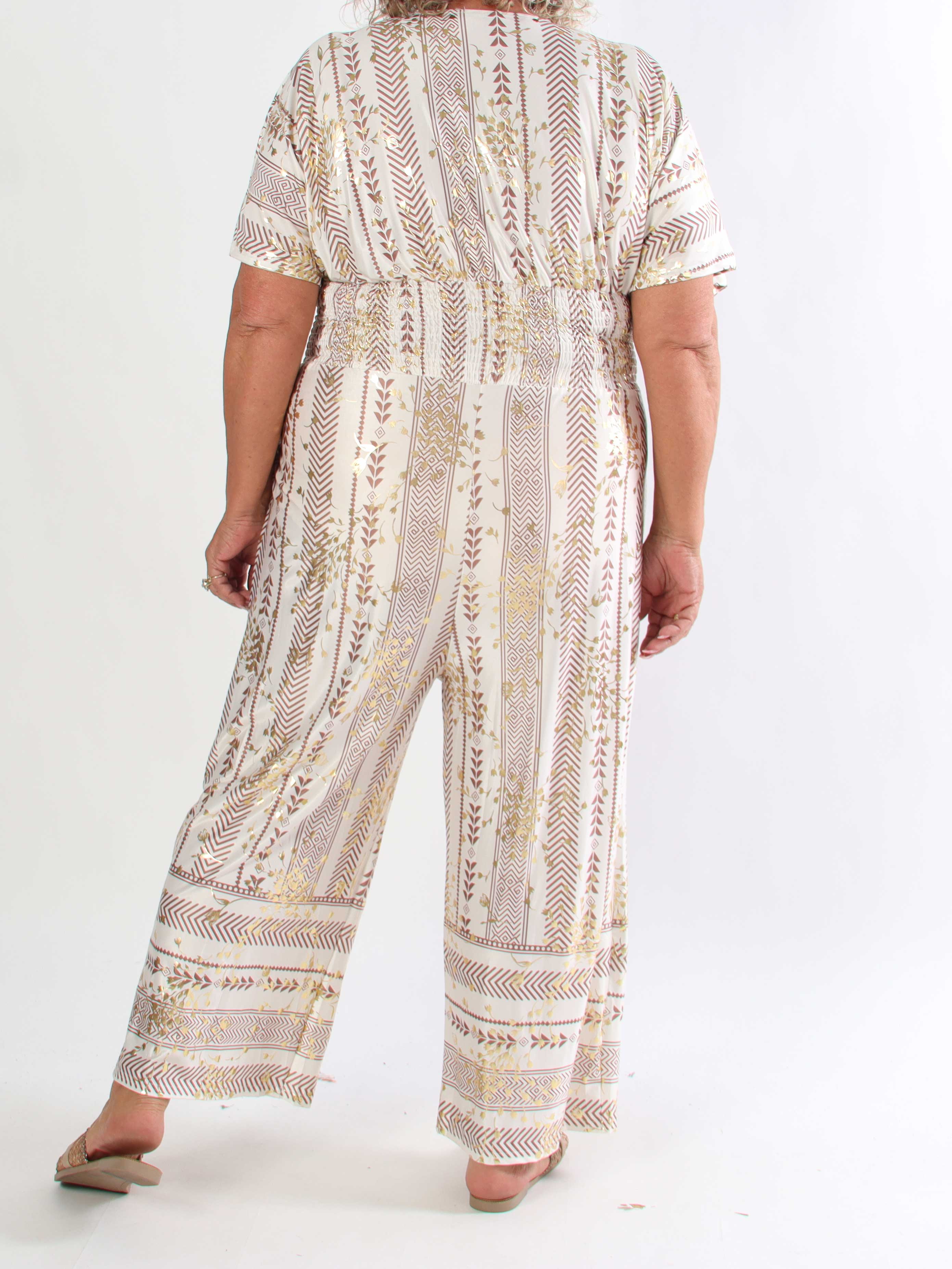 Pams Tribal Jumpsuit - Plus size mønstret buksedragt med små guld blomster