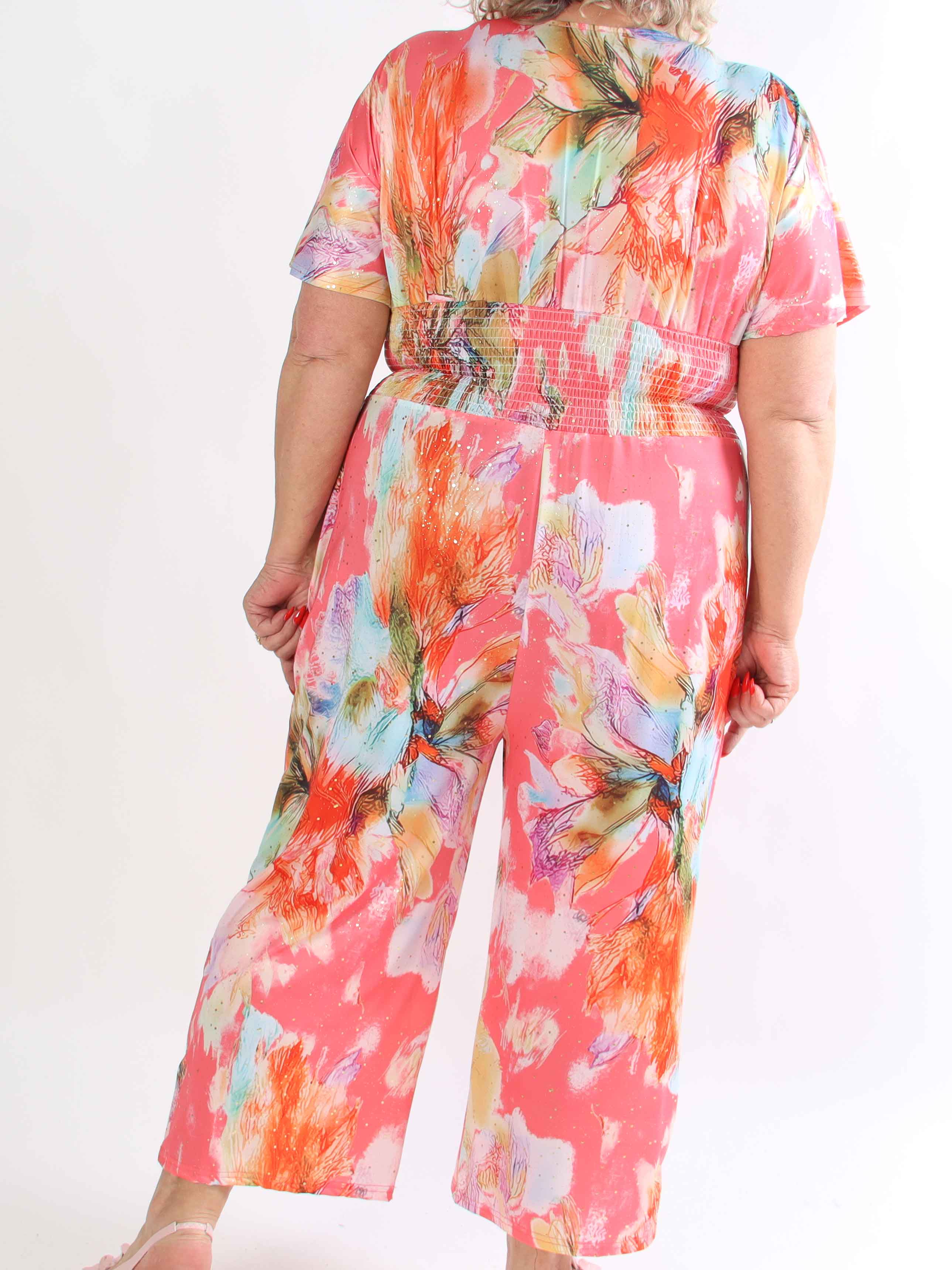 Pams Print Jumpsuit - Stretchig mönstrad plus size jumpsuit med guldfärgat damm