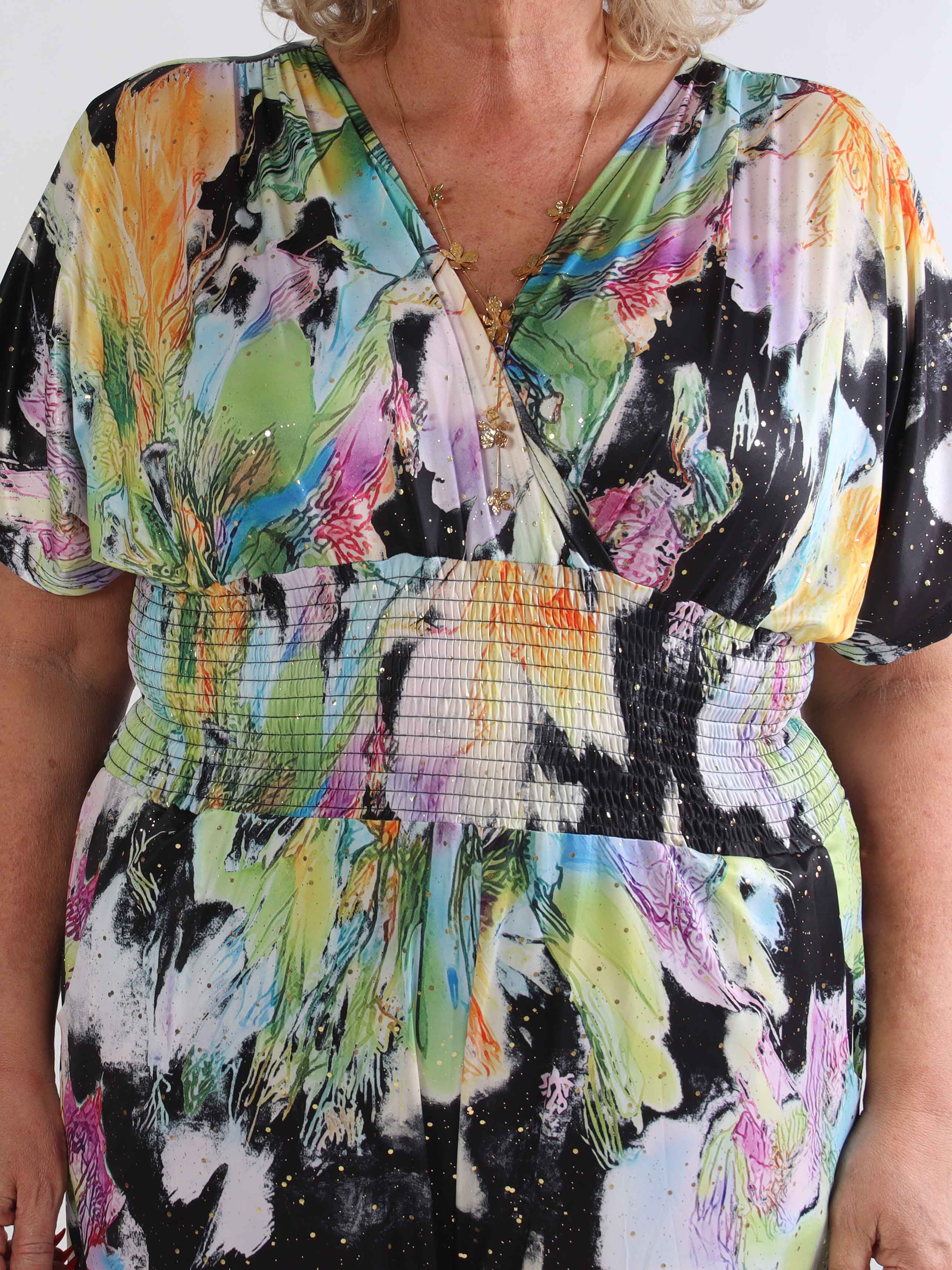 Pams Print Jumpsuit - Stretchig mönstrad plus size jumpsuit med guldfärgat damm