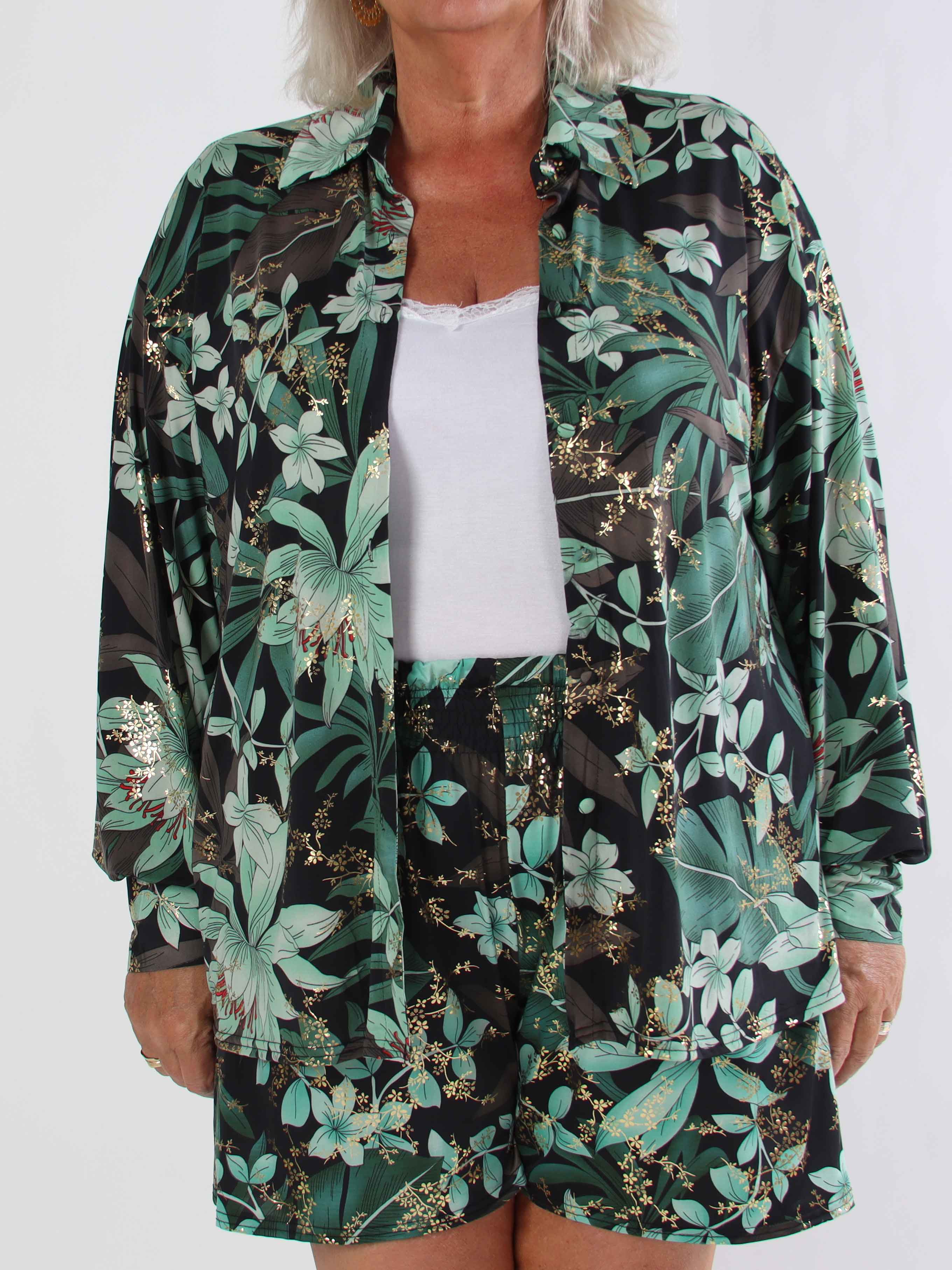 Pamy - Plus size skjorta i stretchigt blommigt tyg